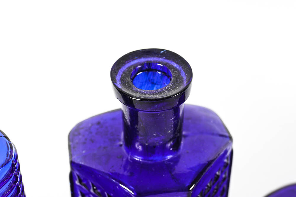 Set of Three Antique Blue Glass Bottles