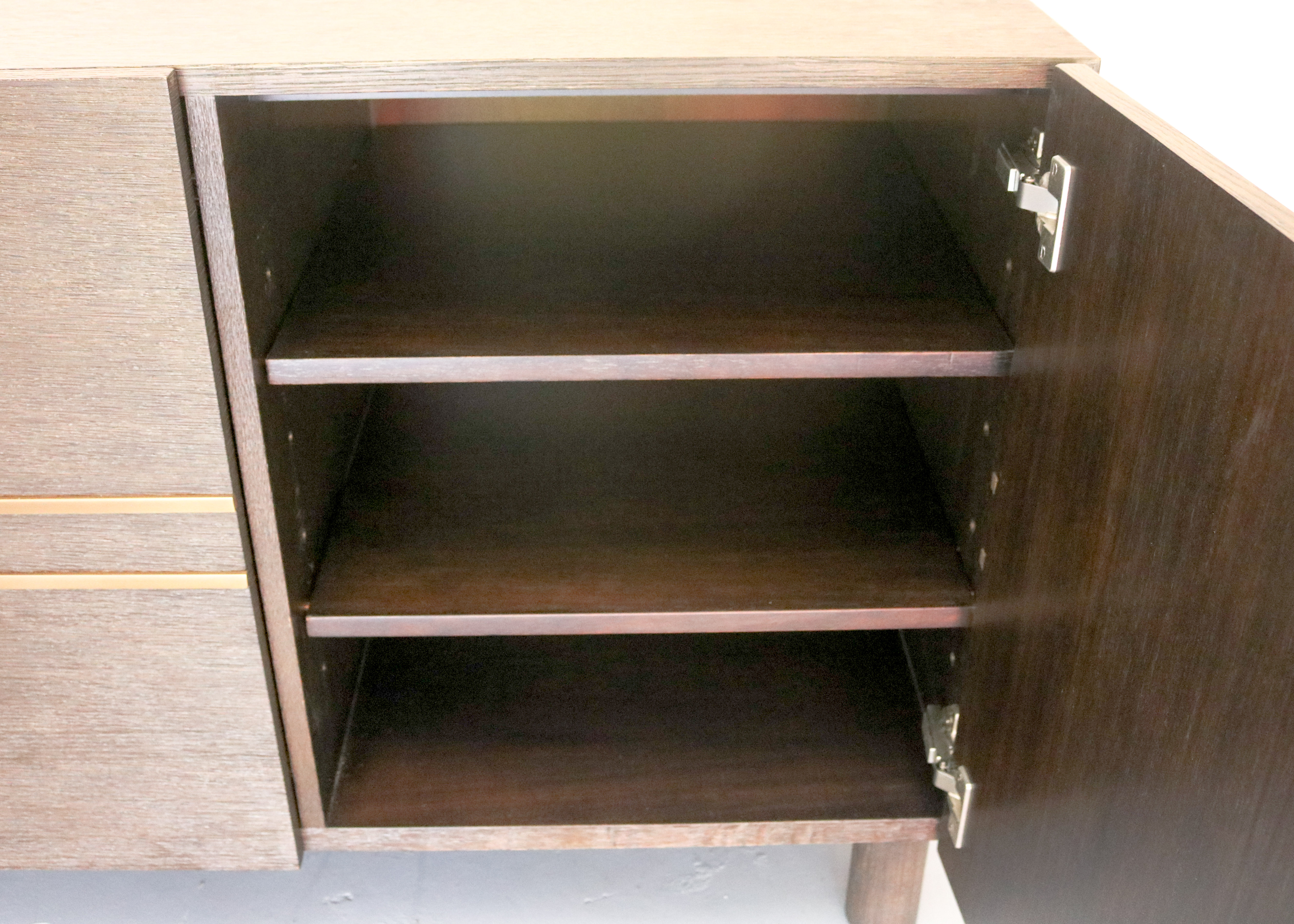Modern-Style Wooden Credenza with Brass Inlay