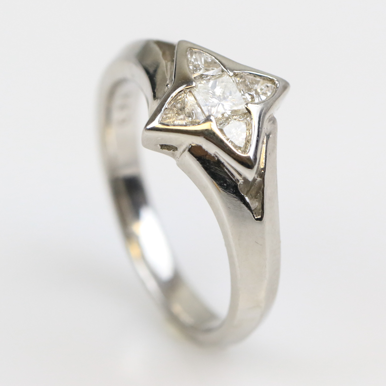 Platinum and Invisible Set Diamond Four-Point Star Ring
