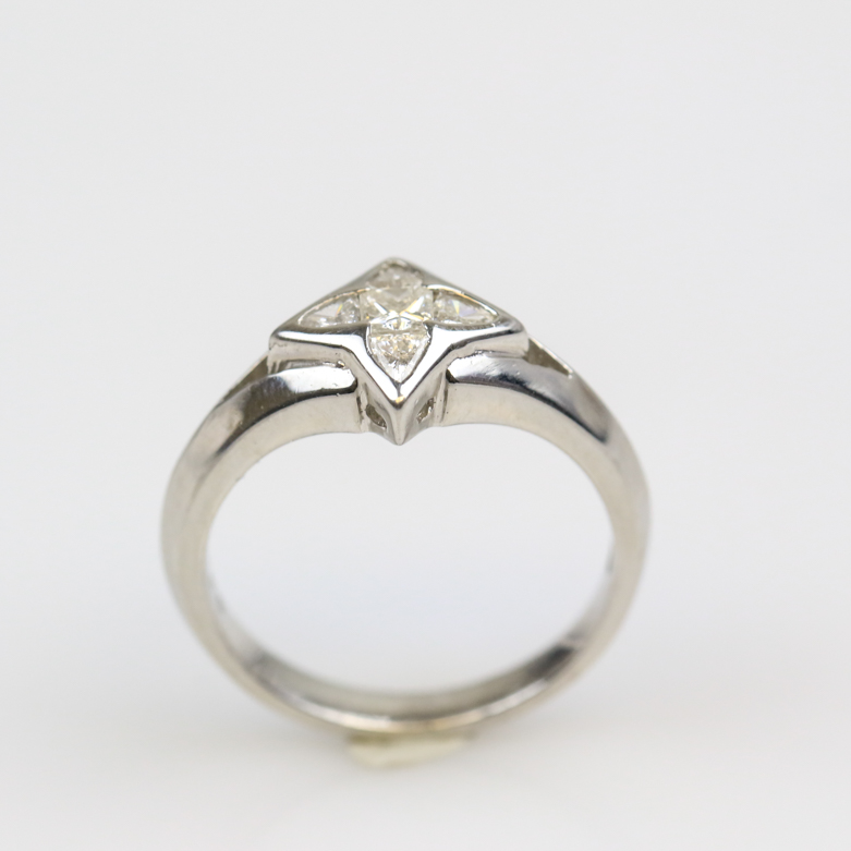 Platinum and Invisible Set Diamond Four-Point Star Ring