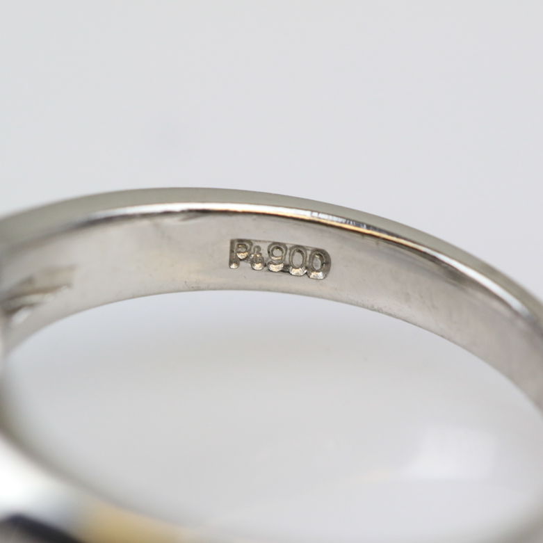 Platinum and Invisible Set Diamond Four-Point Star Ring