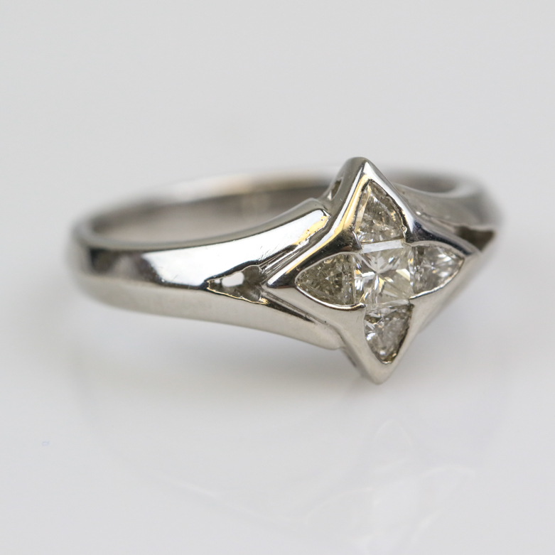Platinum and Invisible Set Diamond Four-Point Star Ring