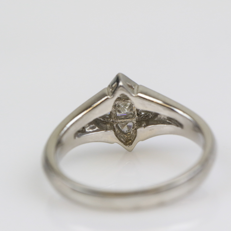 Platinum and Invisible Set Diamond Four-Point Star Ring