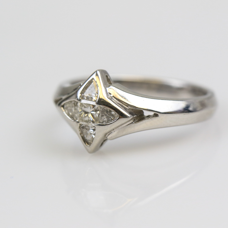 Platinum and Invisible Set Diamond Four-Point Star Ring