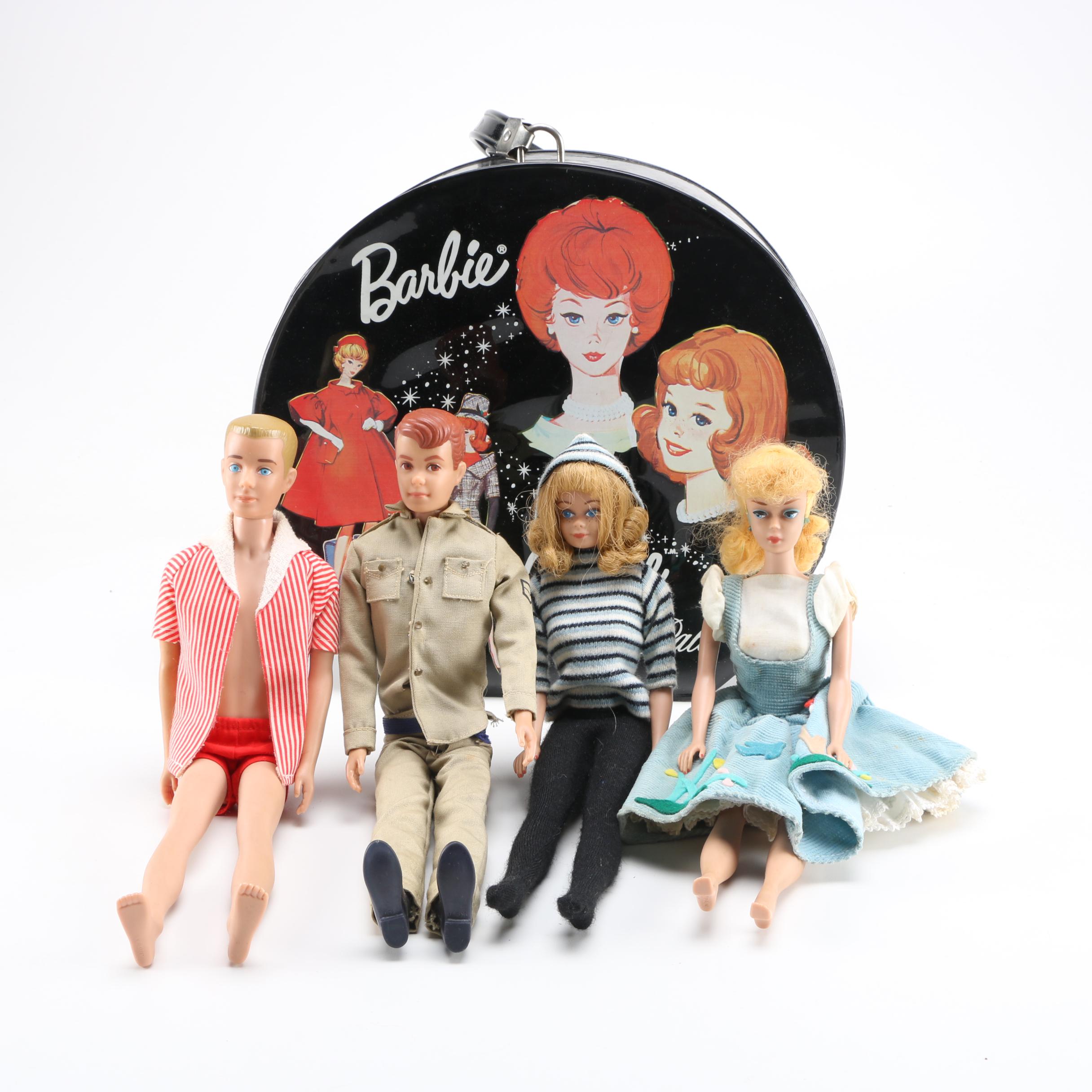 Collection of Vintage Ken, Alan, Midge and Barbie dolls.