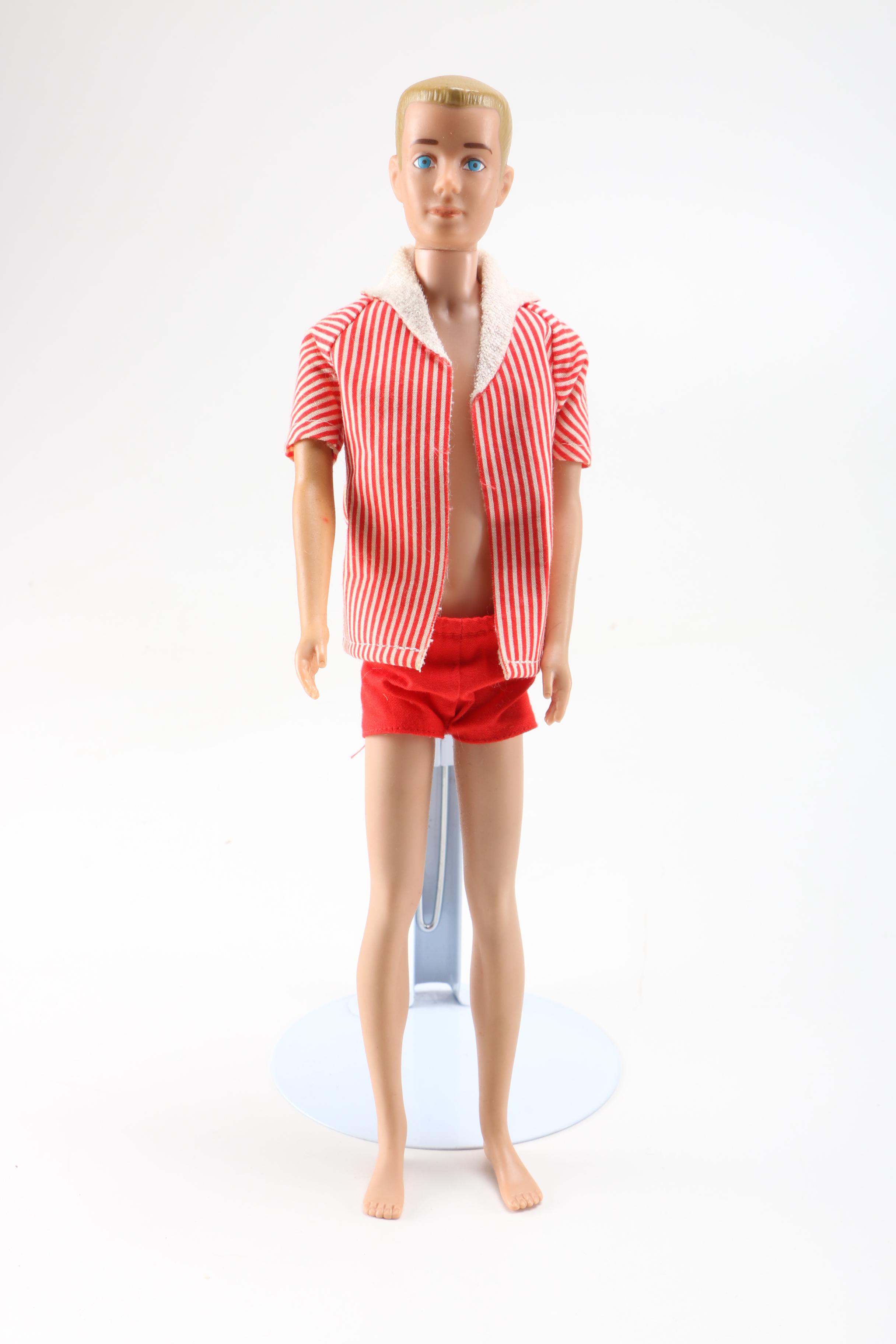 Collection of Vintage Ken, Alan, Midge and Barbie dolls.