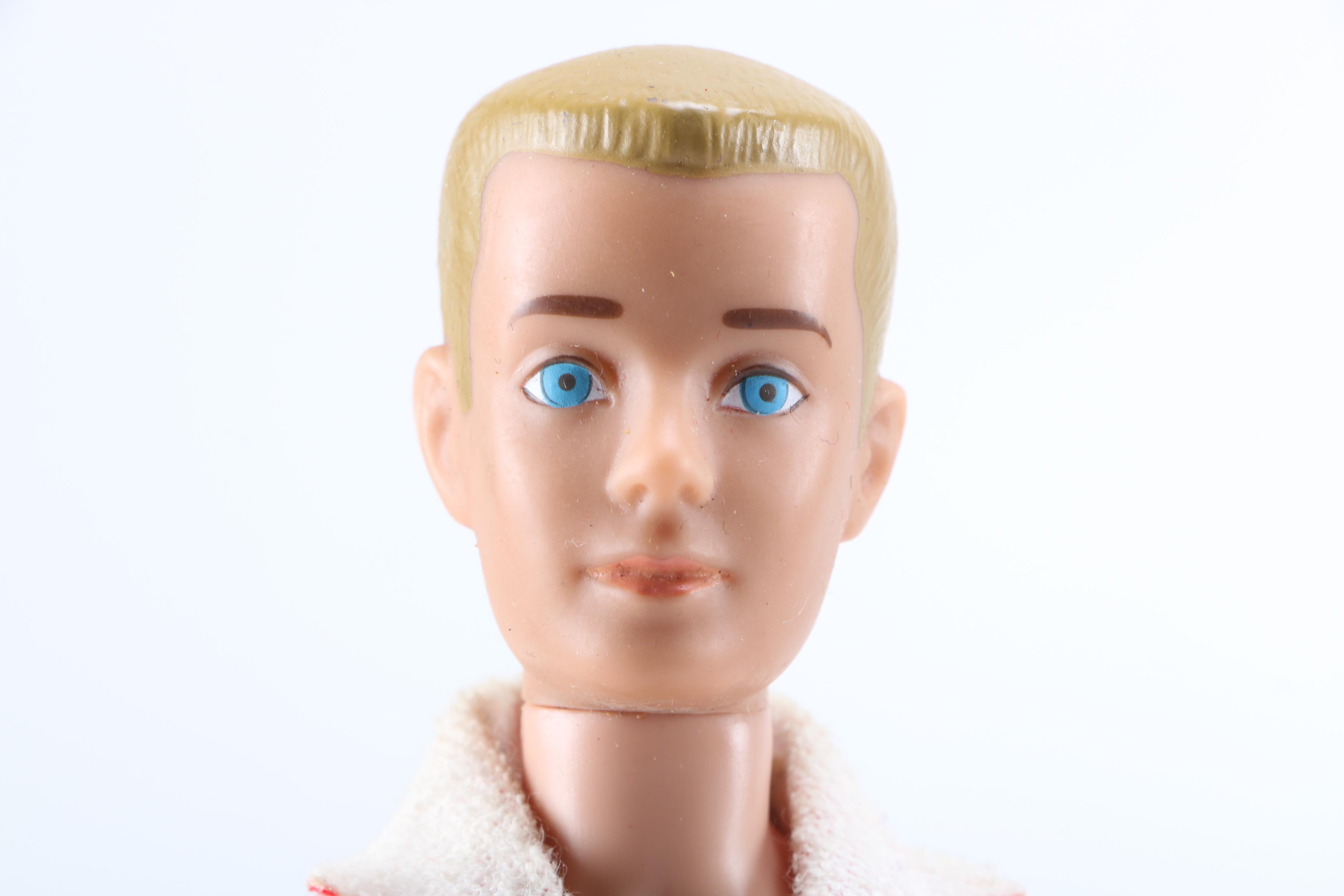 Collection of Vintage Ken, Alan, Midge and Barbie dolls.