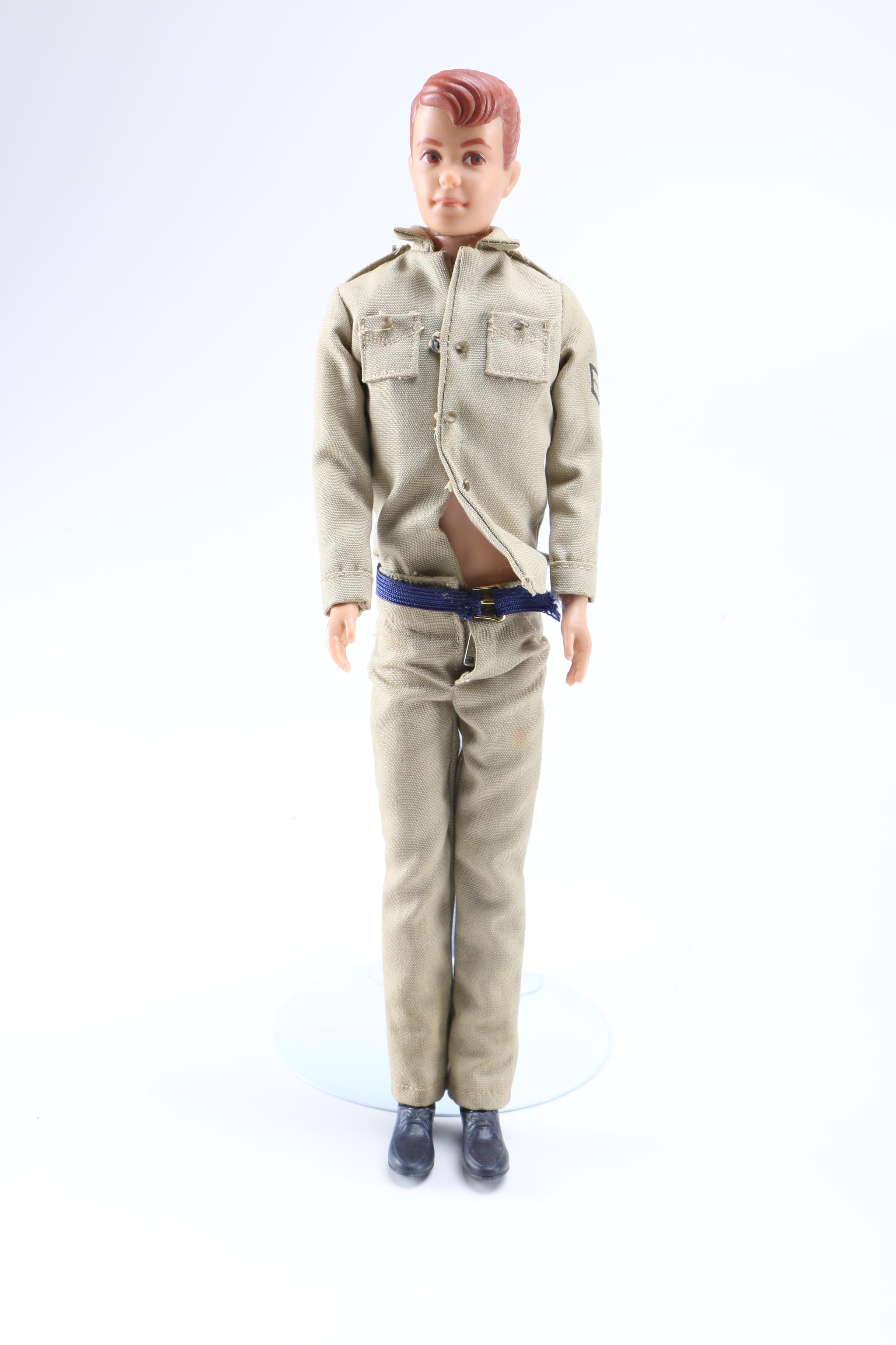 Collection of Vintage Ken, Alan, Midge and Barbie dolls.