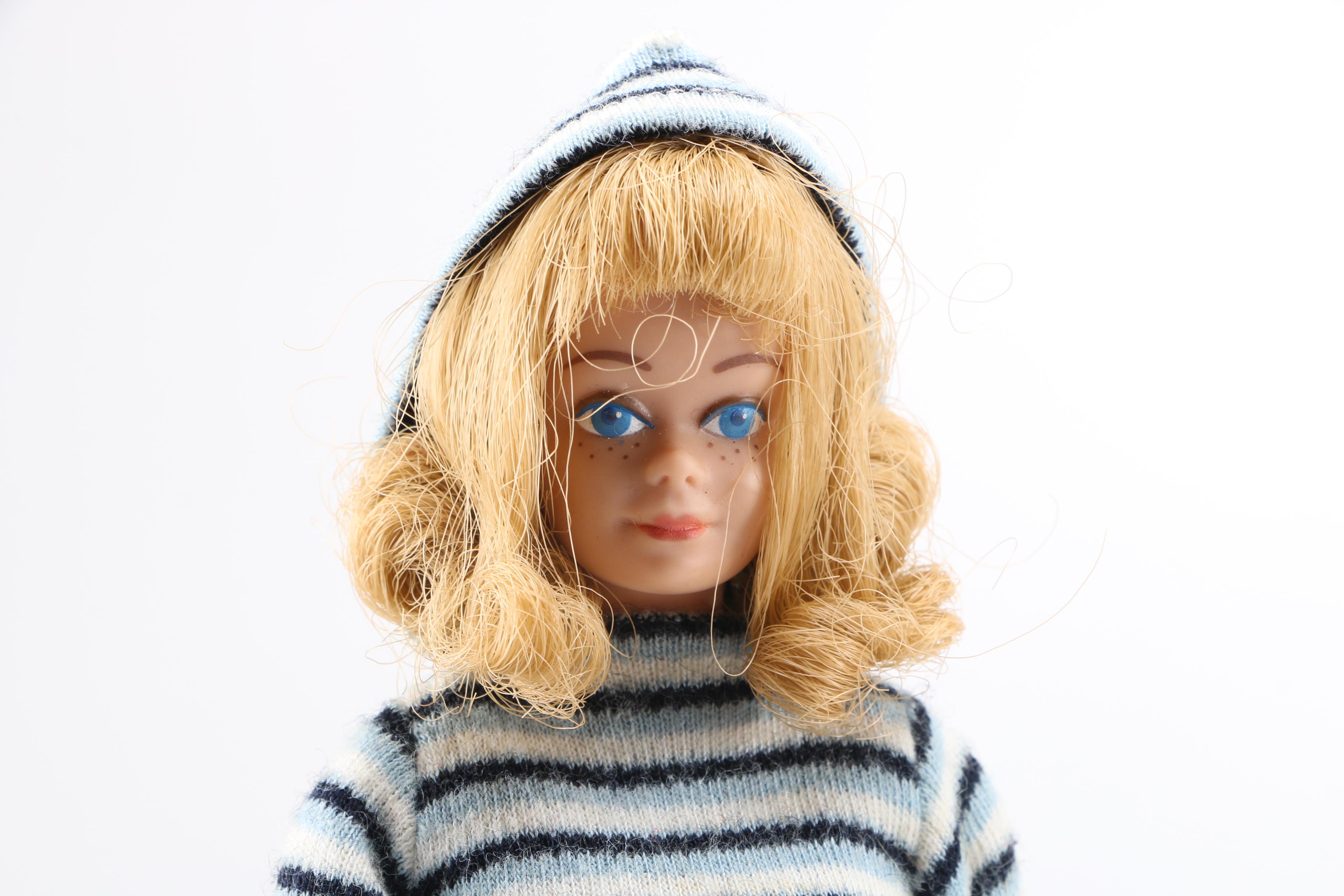 Collection of Vintage Ken, Alan, Midge and Barbie dolls.