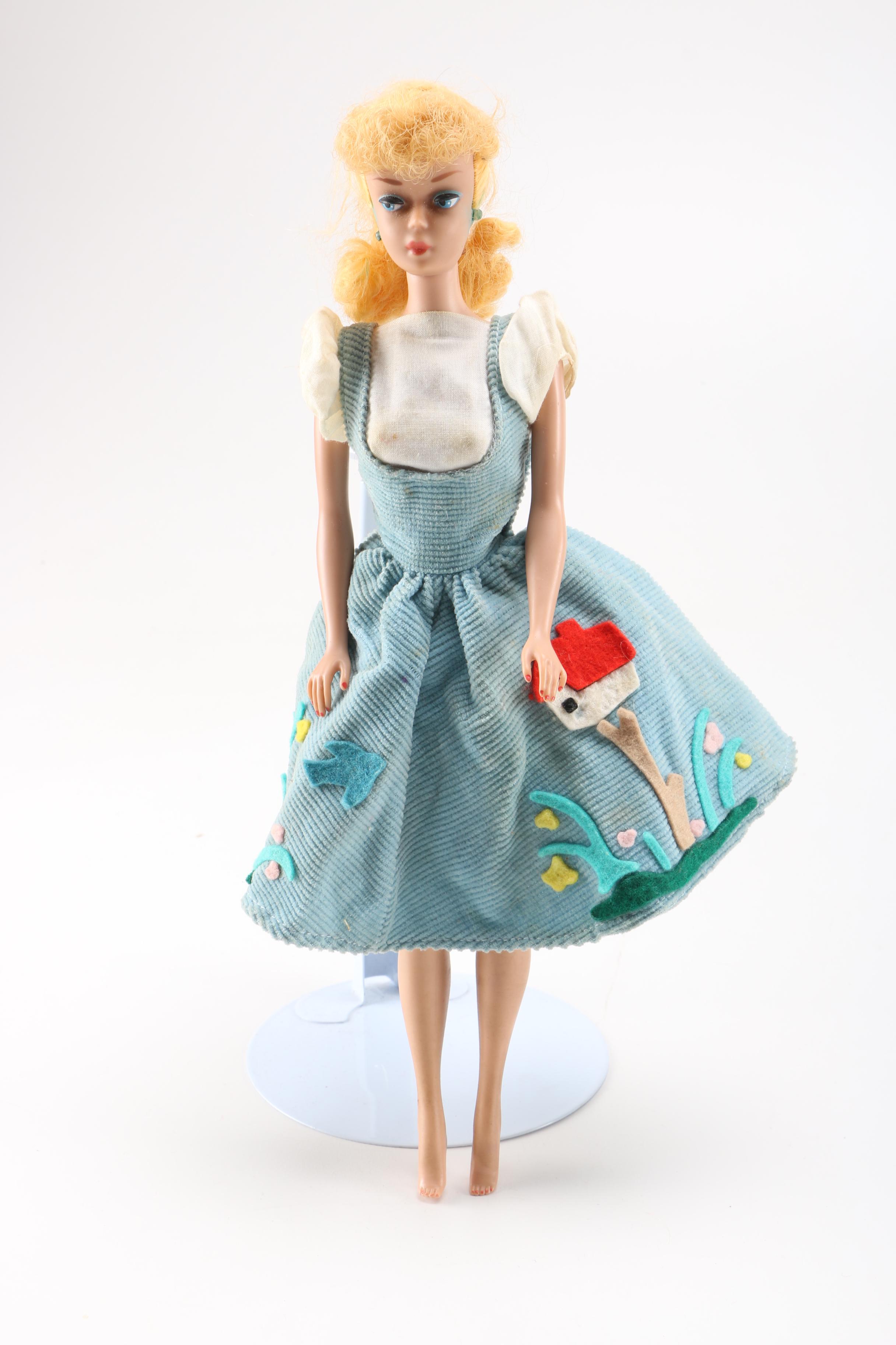 Collection of Vintage Ken, Alan, Midge and Barbie dolls.