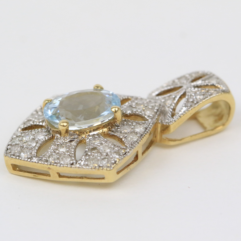 10K Two-Tone Gold, Aquamarine, and Diamond Pierced Drop Pendant