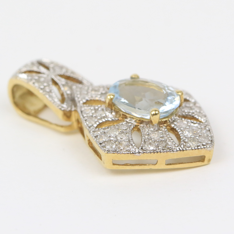 10K Two-Tone Gold, Aquamarine, and Diamond Pierced Drop Pendant