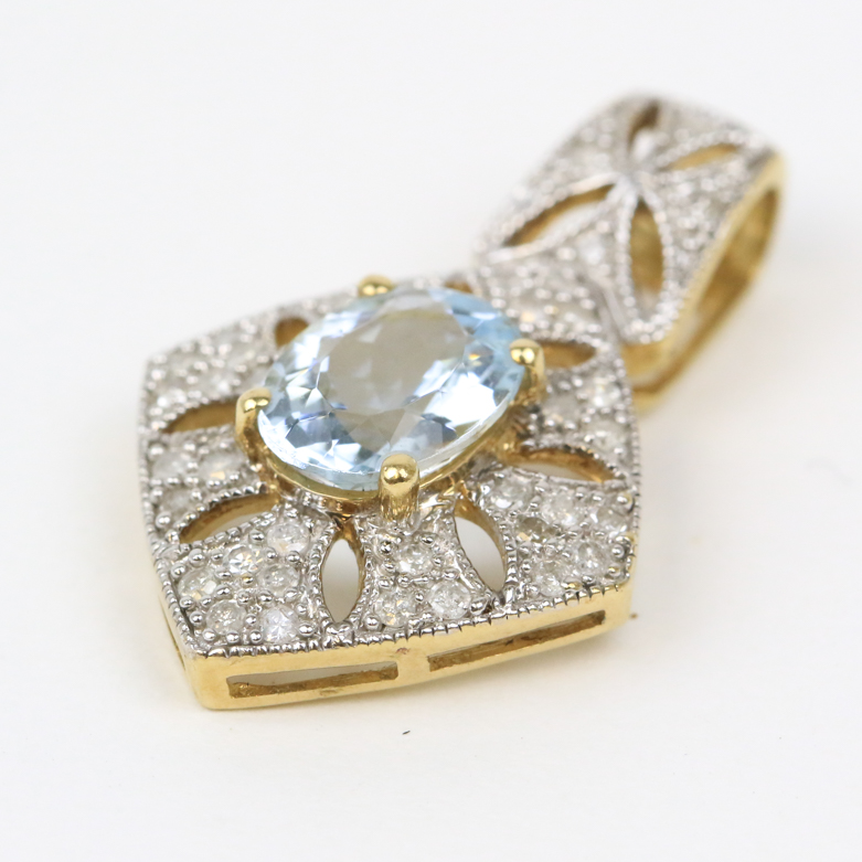 10K Two-Tone Gold, Aquamarine, and Diamond Pierced Drop Pendant