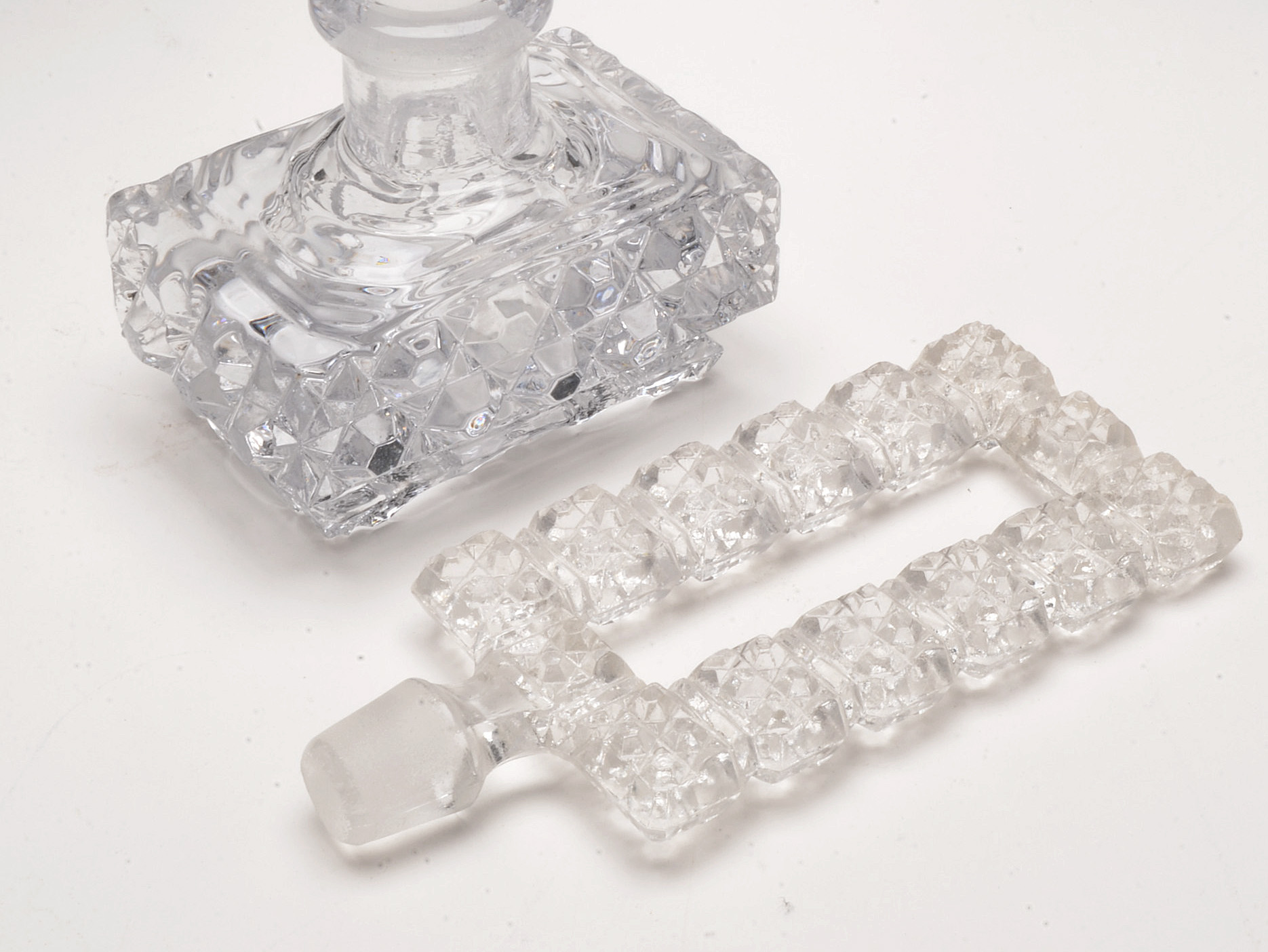 Art Deco Cut and Pressed Glass Perfume Bottles Including Irice