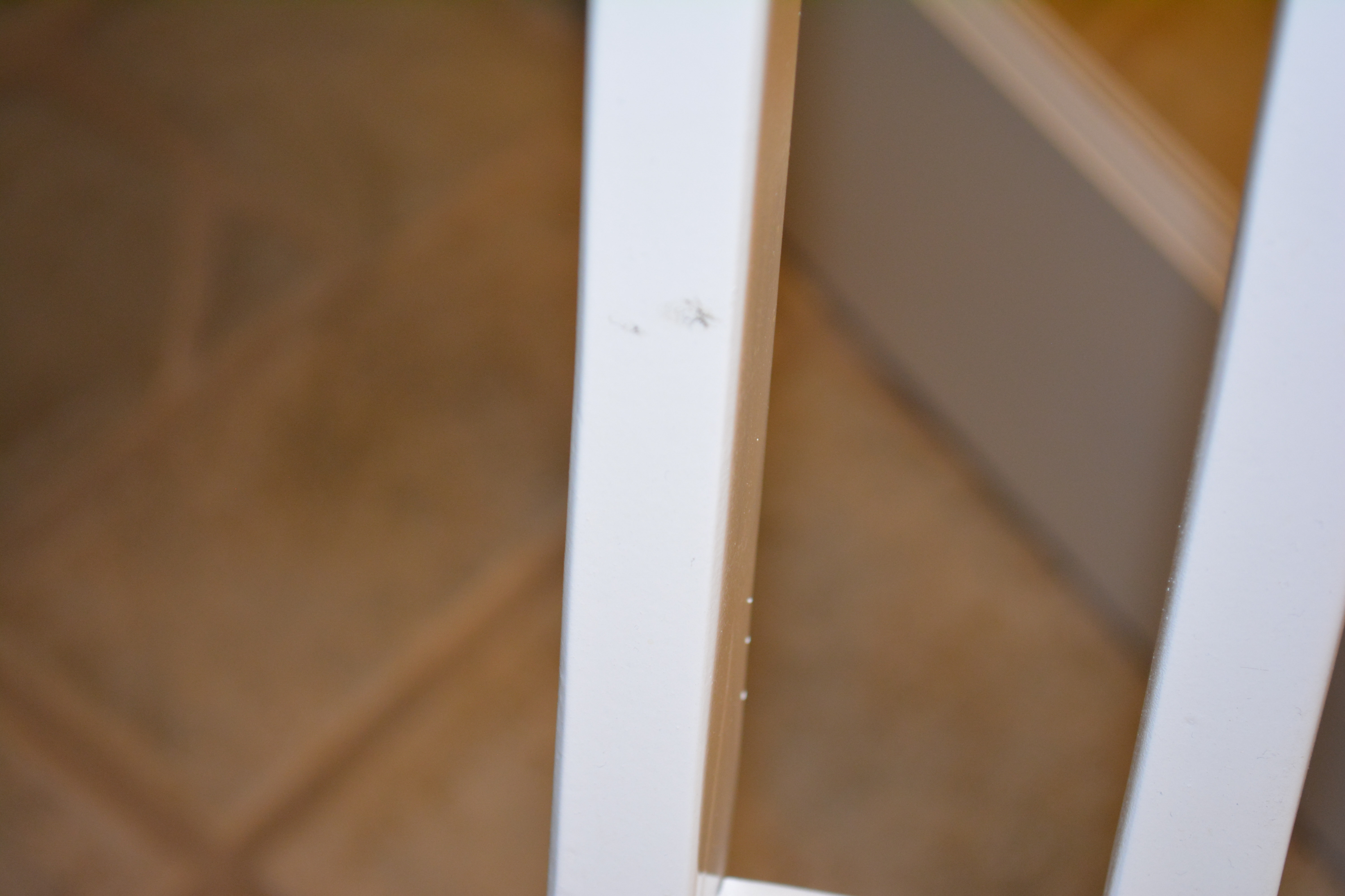 White Bistro Set With Yellow Cushions