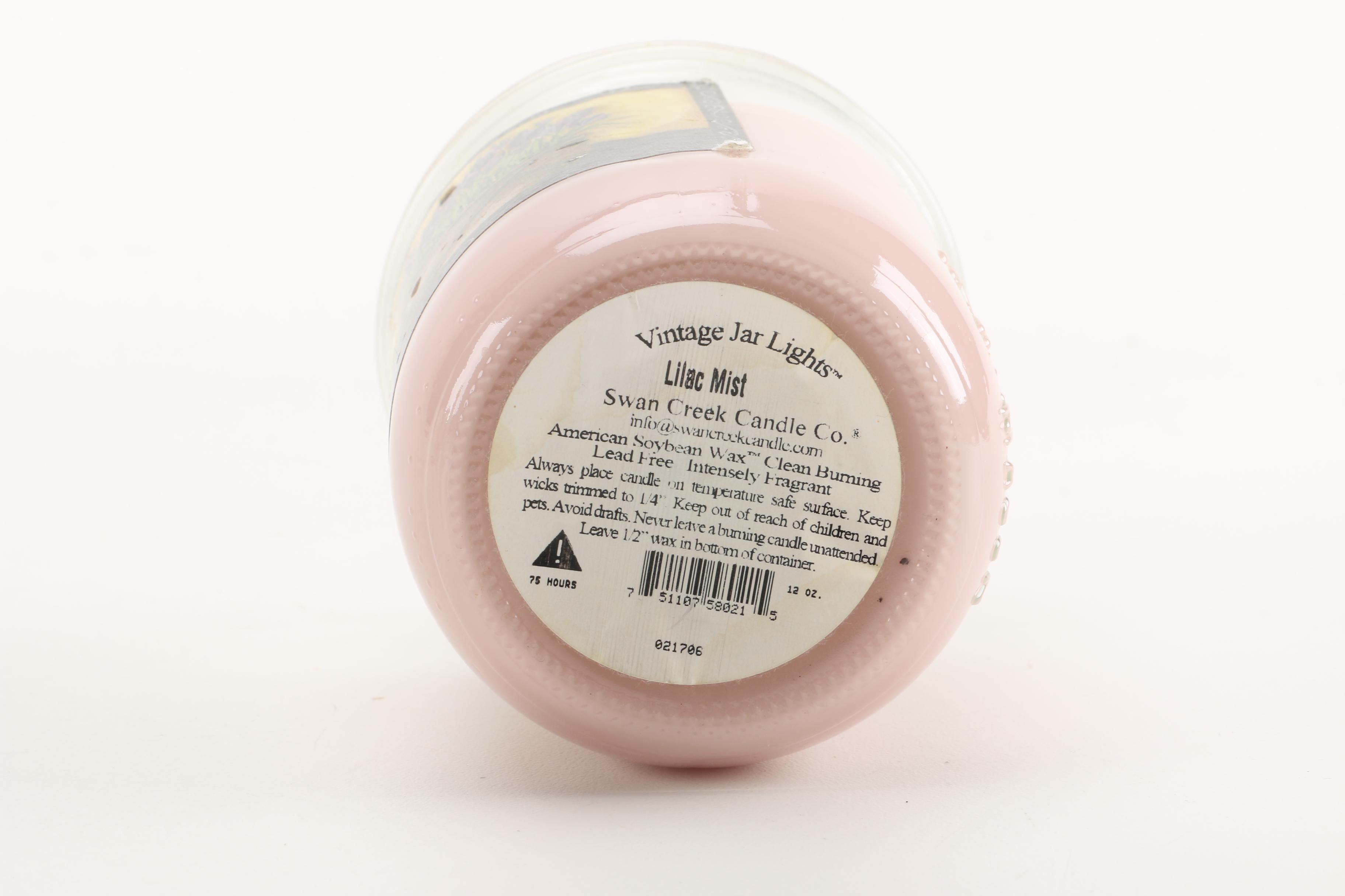 Collection of Candles and Candle Holders