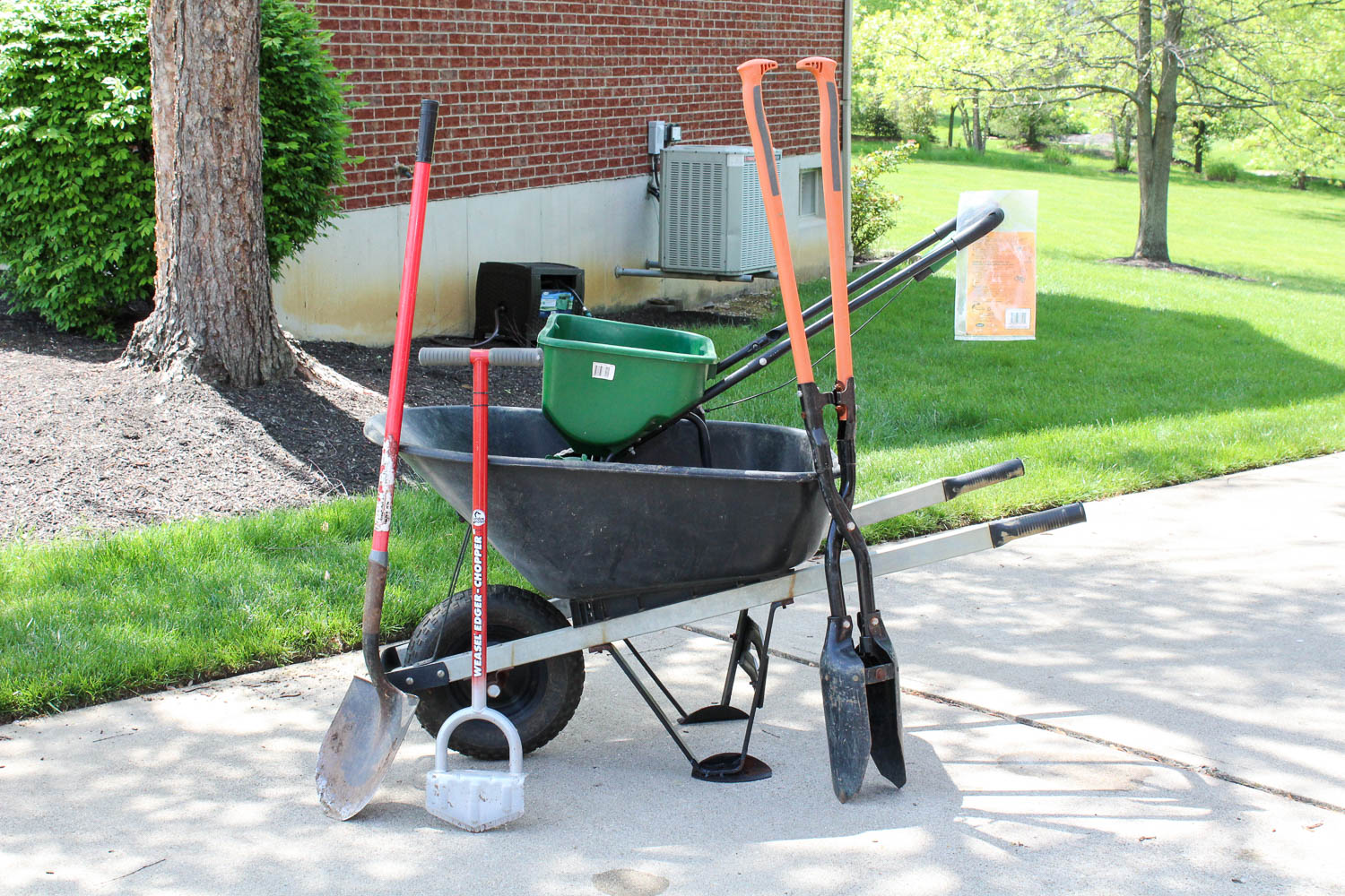 Wheelbarrow with Other Lawn and Garden Tools