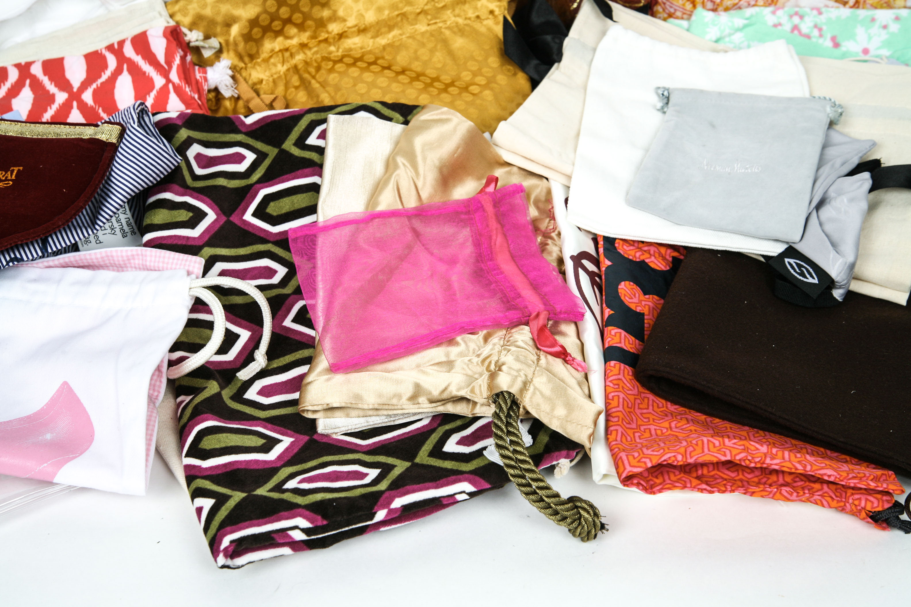 Collection of Fabric Dust Bags Including Tory Burch