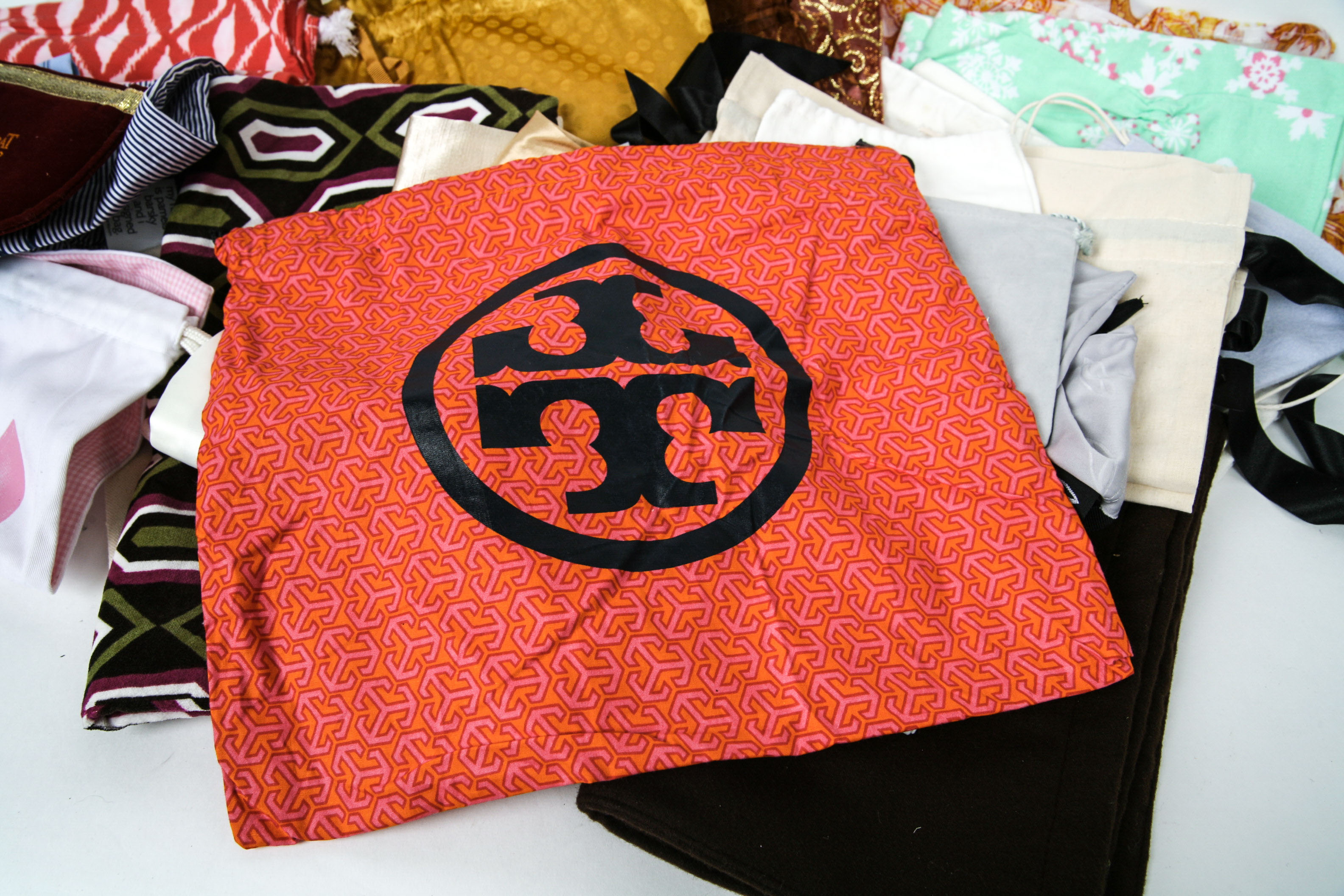 Collection of Fabric Dust Bags Including Tory Burch