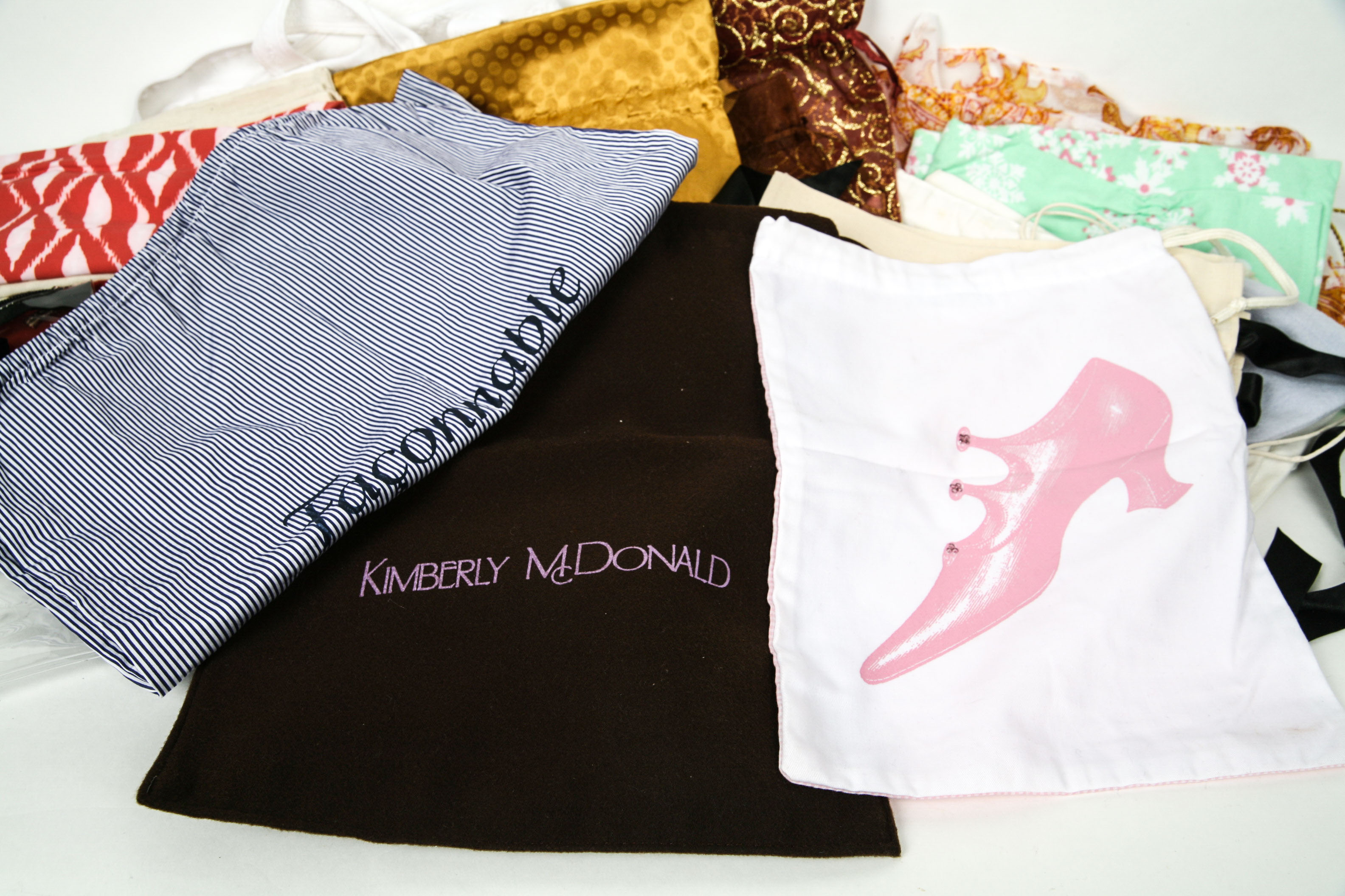 Collection of Fabric Dust Bags Including Tory Burch