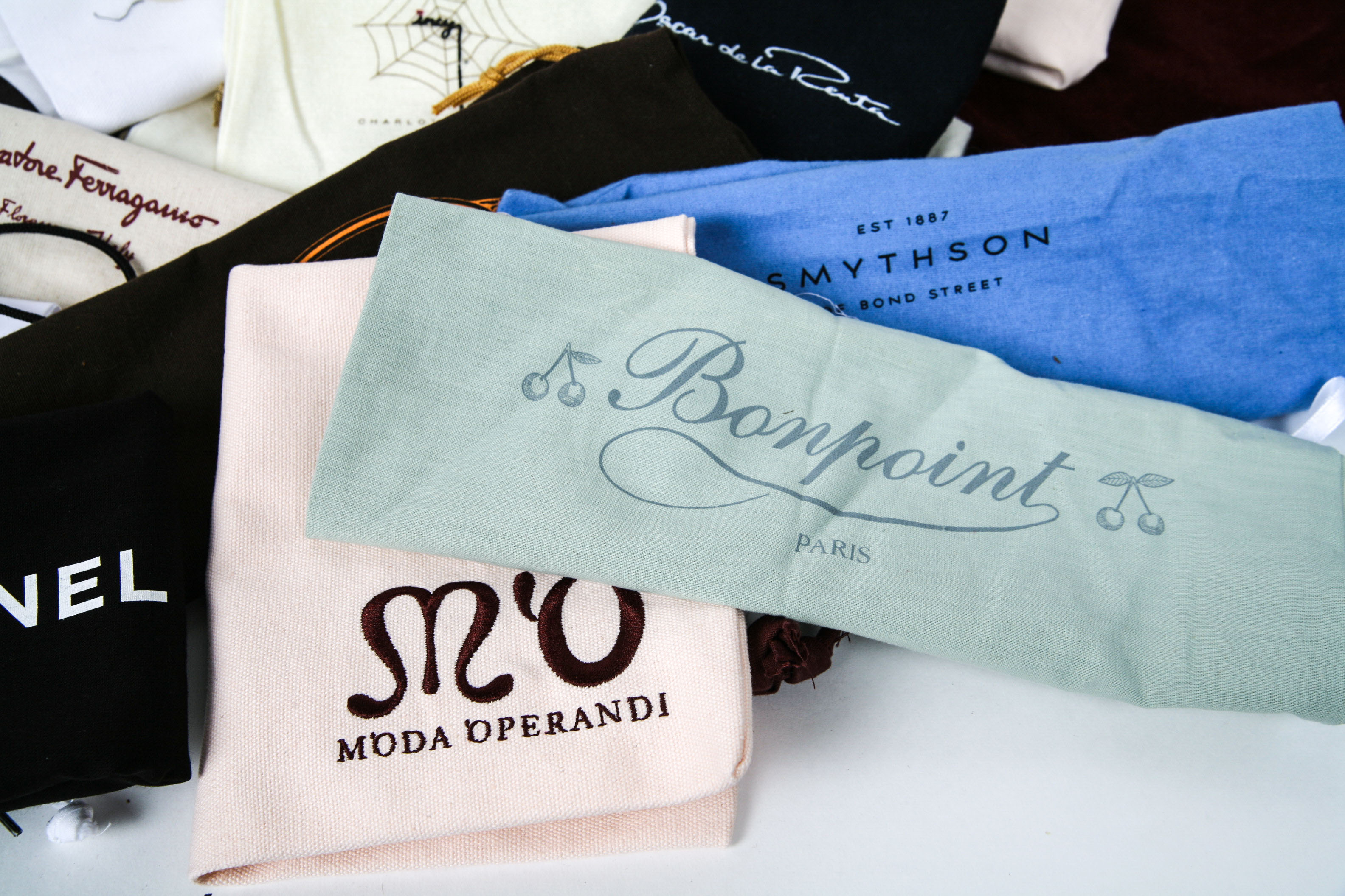 Assortment of Designer Handbag Dust Covers