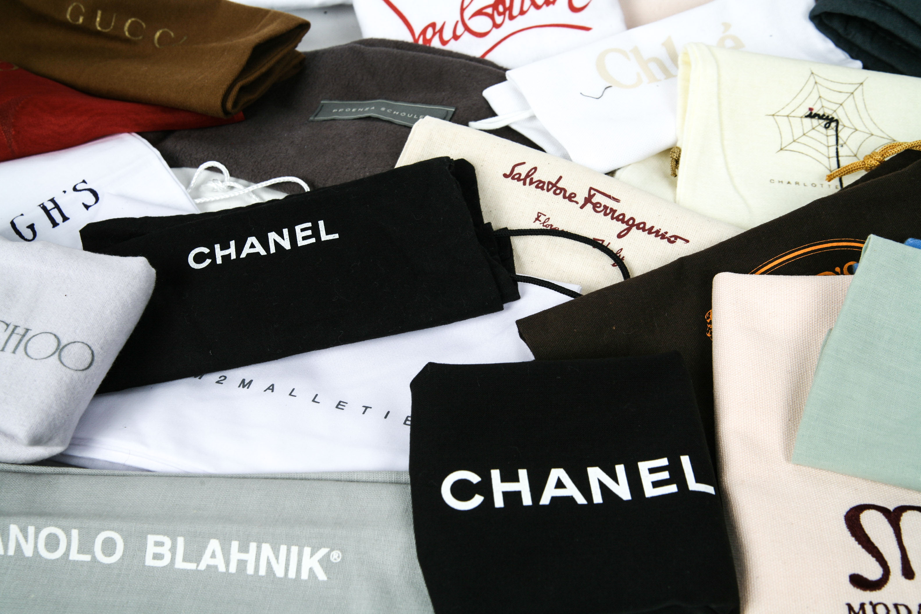 Assortment of Designer Handbag Dust Covers