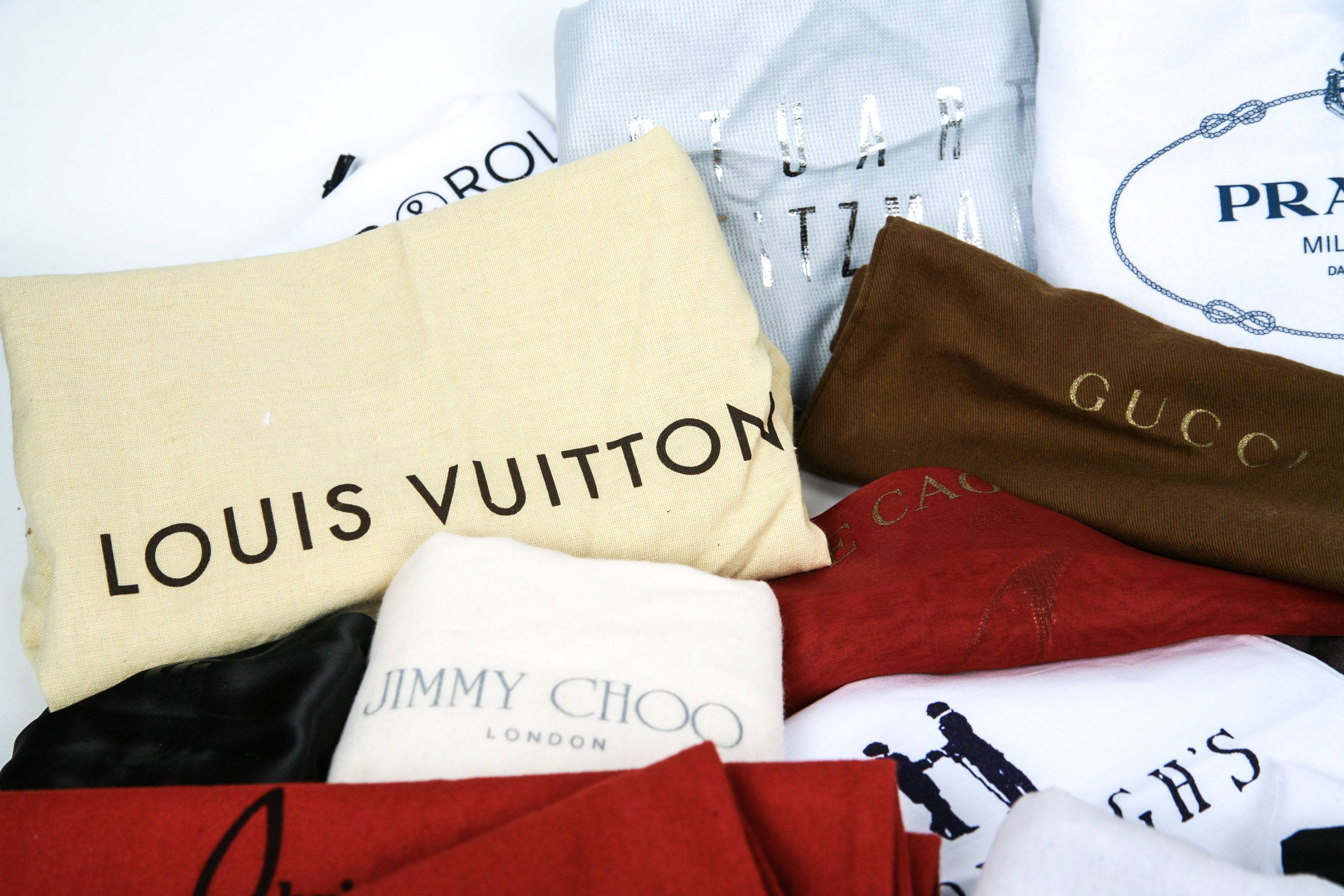 Assortment of Designer Handbag Dust Covers