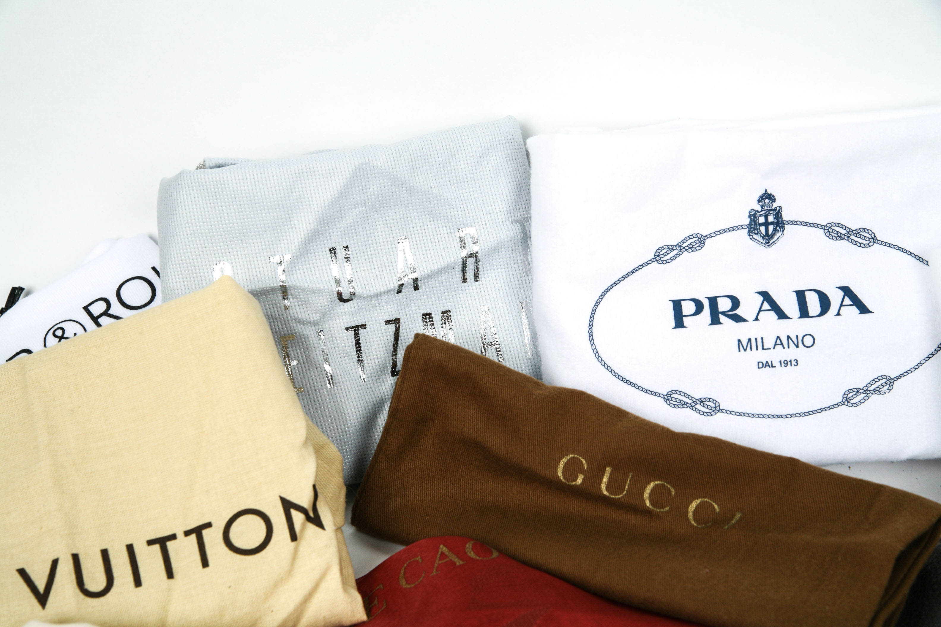 Assortment of Designer Handbag Dust Covers