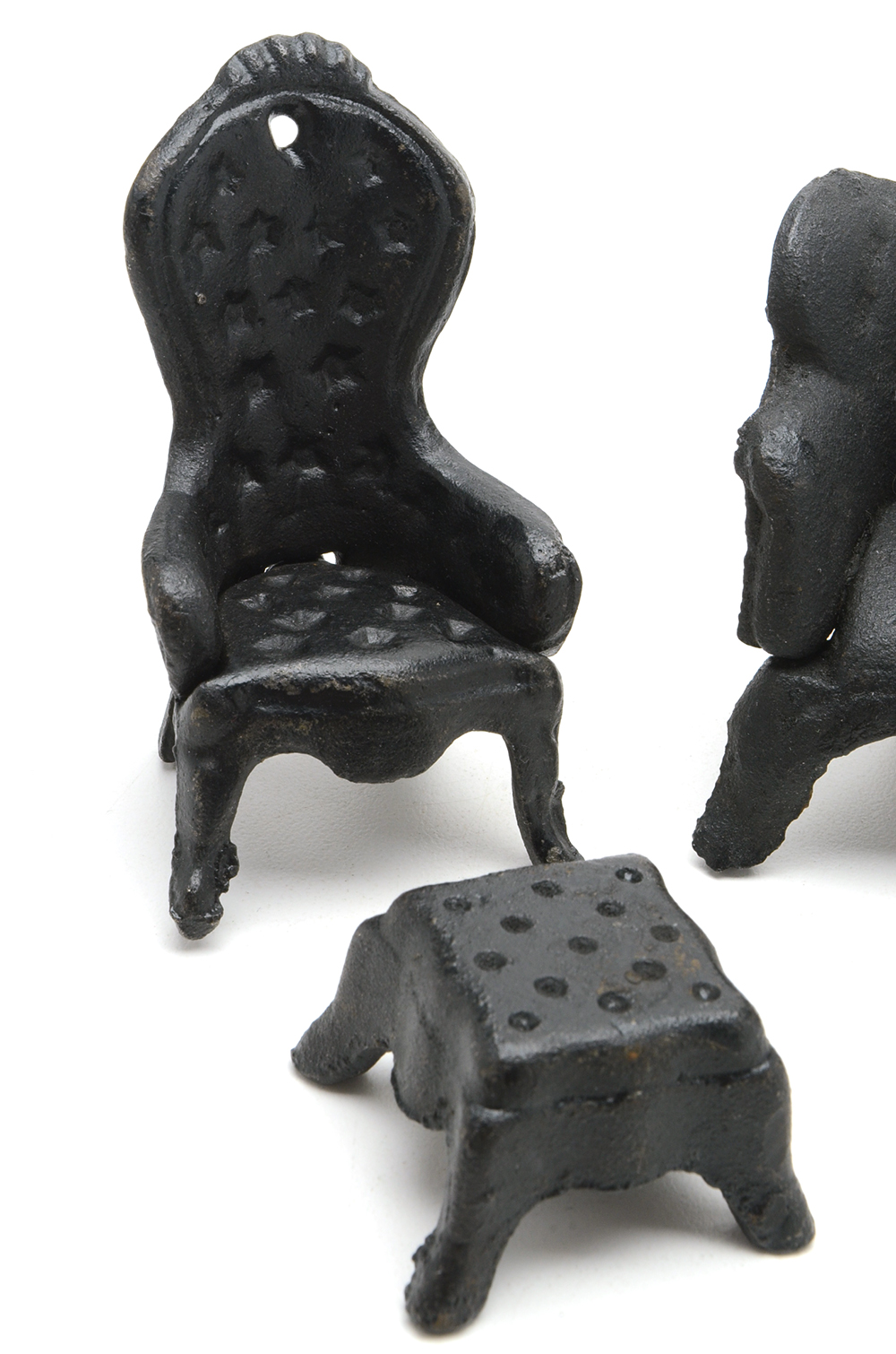 Miniature Cast Iron Settee, Chair, and Ottoman
