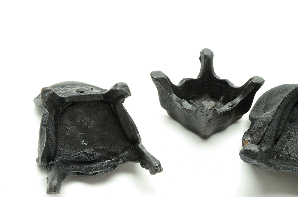 Miniature Cast Iron Settee, Chair, and Ottoman