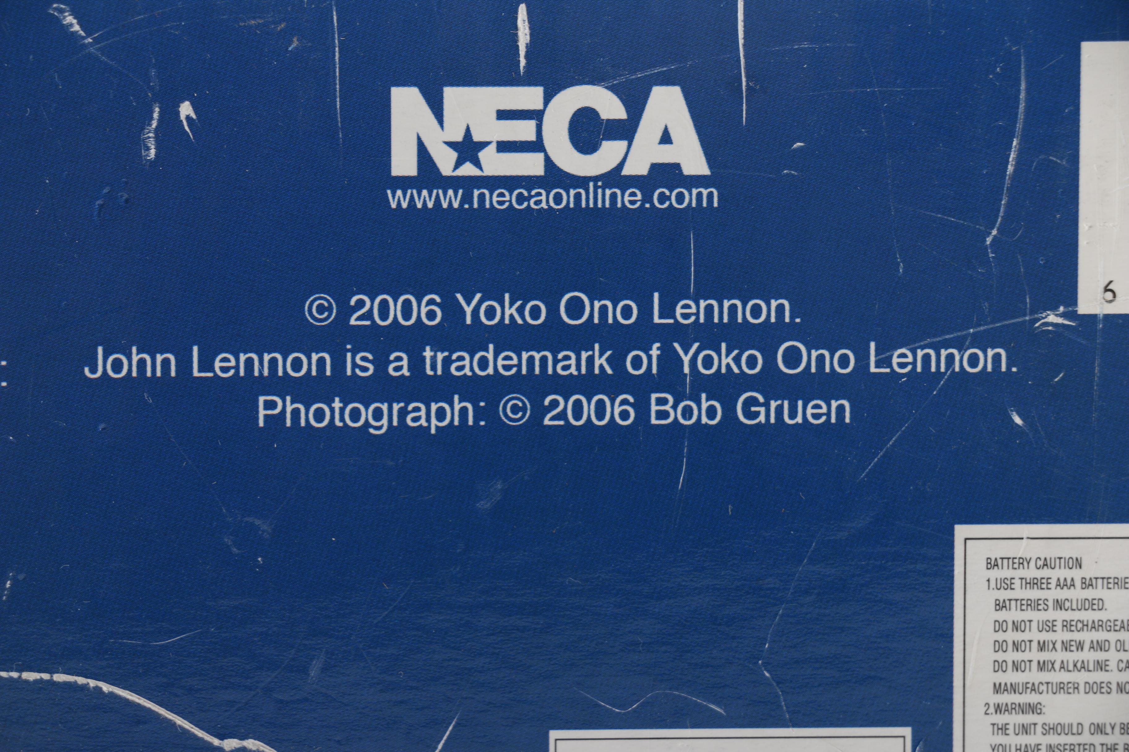 John Lennon Motion Activated Doll