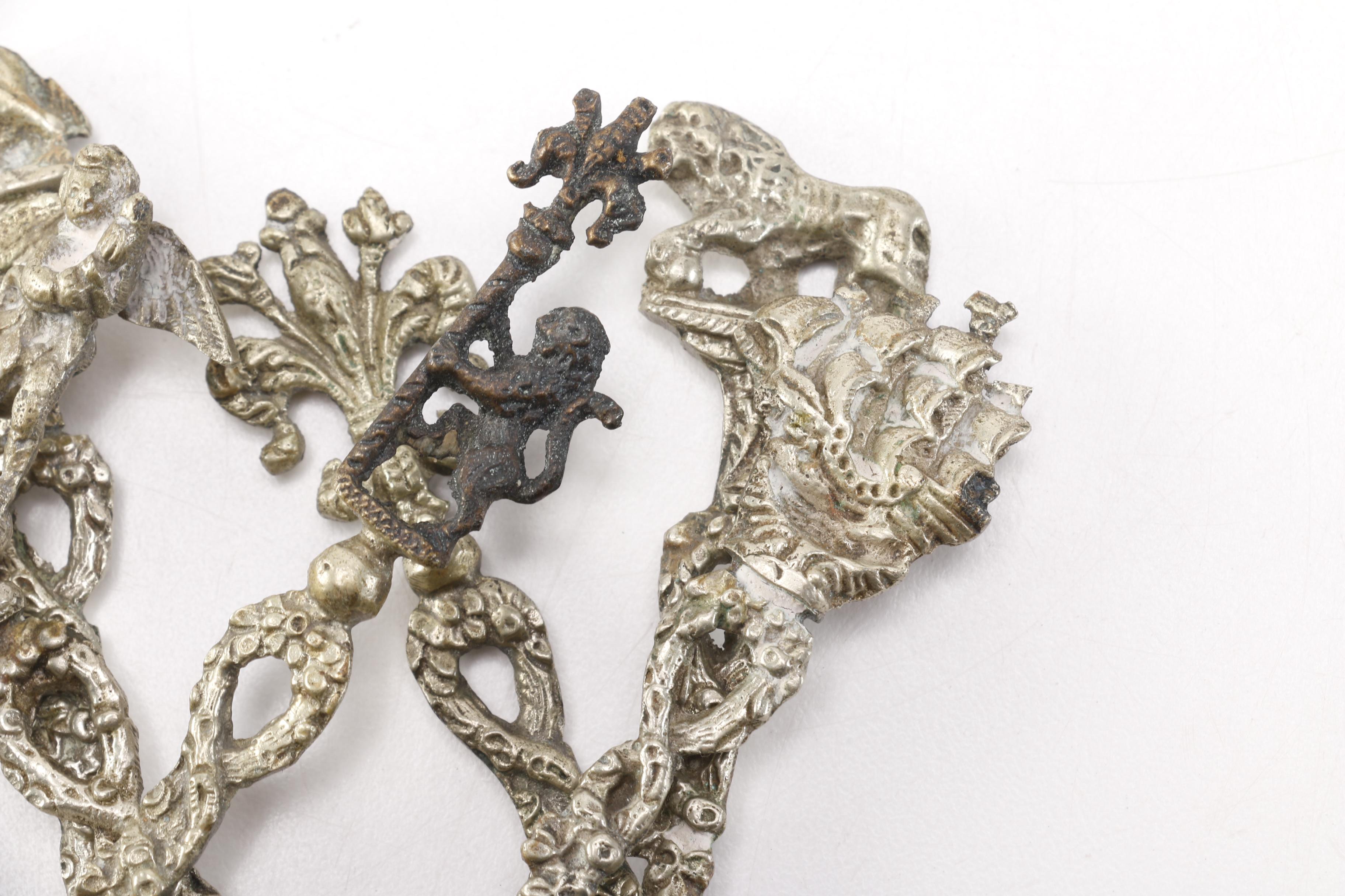 Antique Bronze Spoons