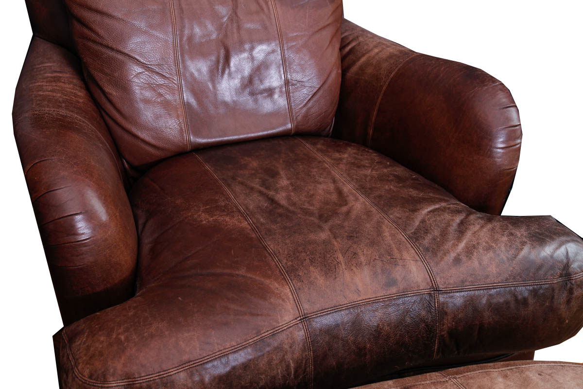 Leather Armchair and Ottoman by Ferguson Copeland Ltd.