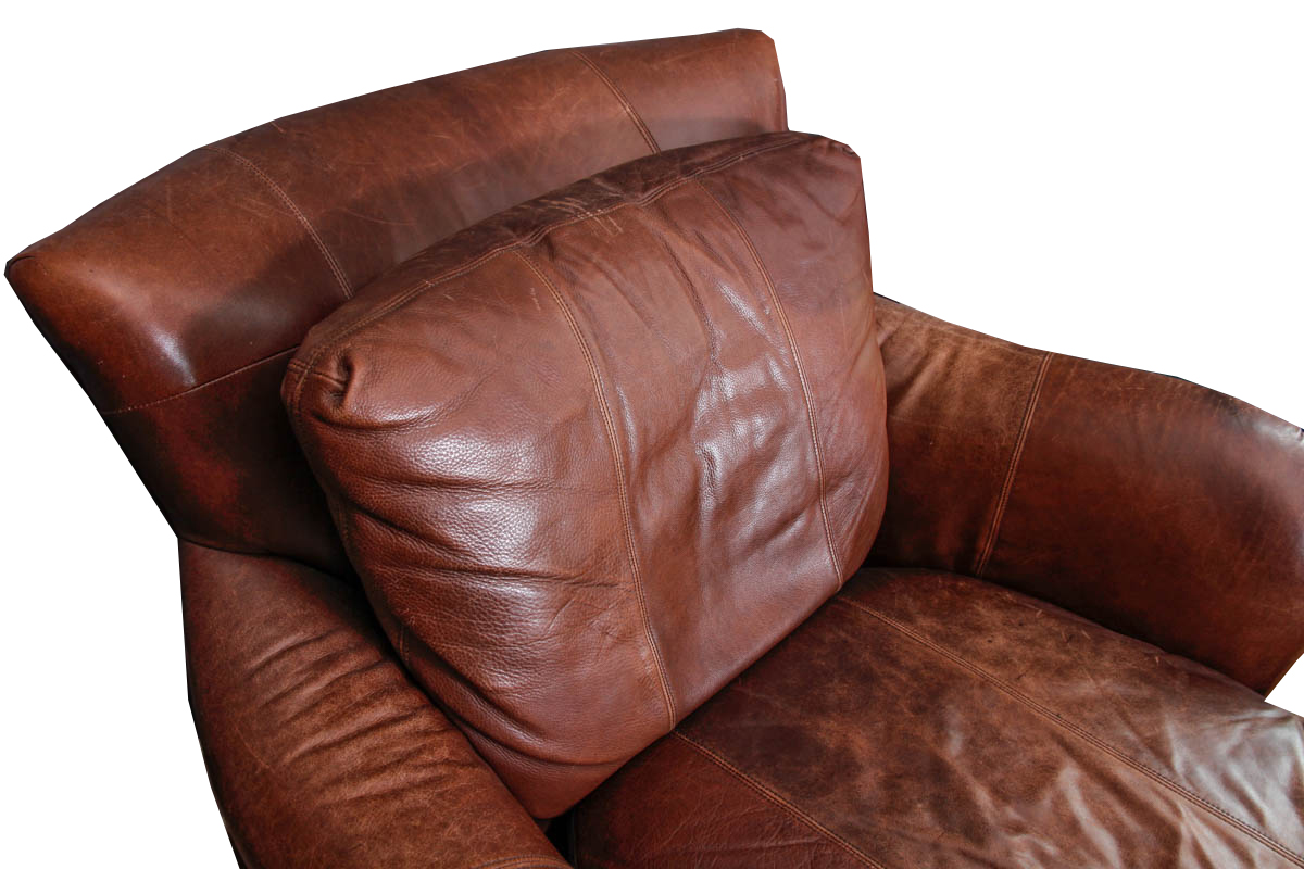 Leather Armchair and Ottoman by Ferguson Copeland Ltd.
