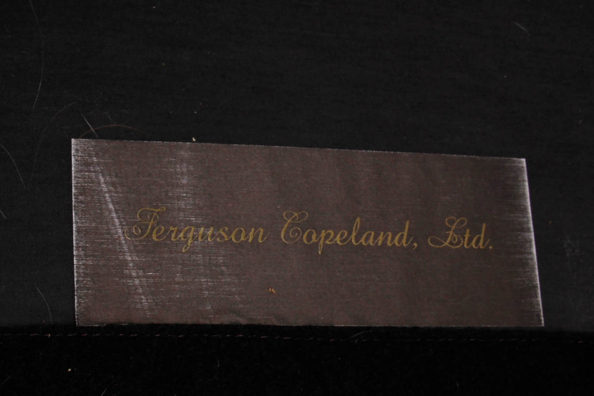 Leather Armchair and Ottoman by Ferguson Copeland Ltd.