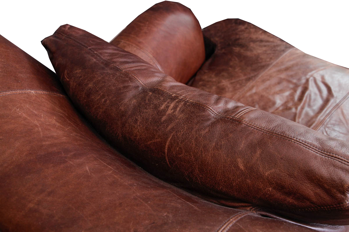 Leather Armchair and Ottoman by Ferguson Copeland Ltd.