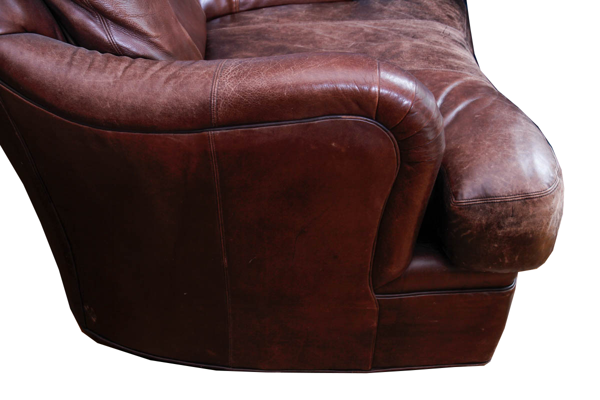 Leather Armchair and Ottoman by Ferguson Copeland Ltd.