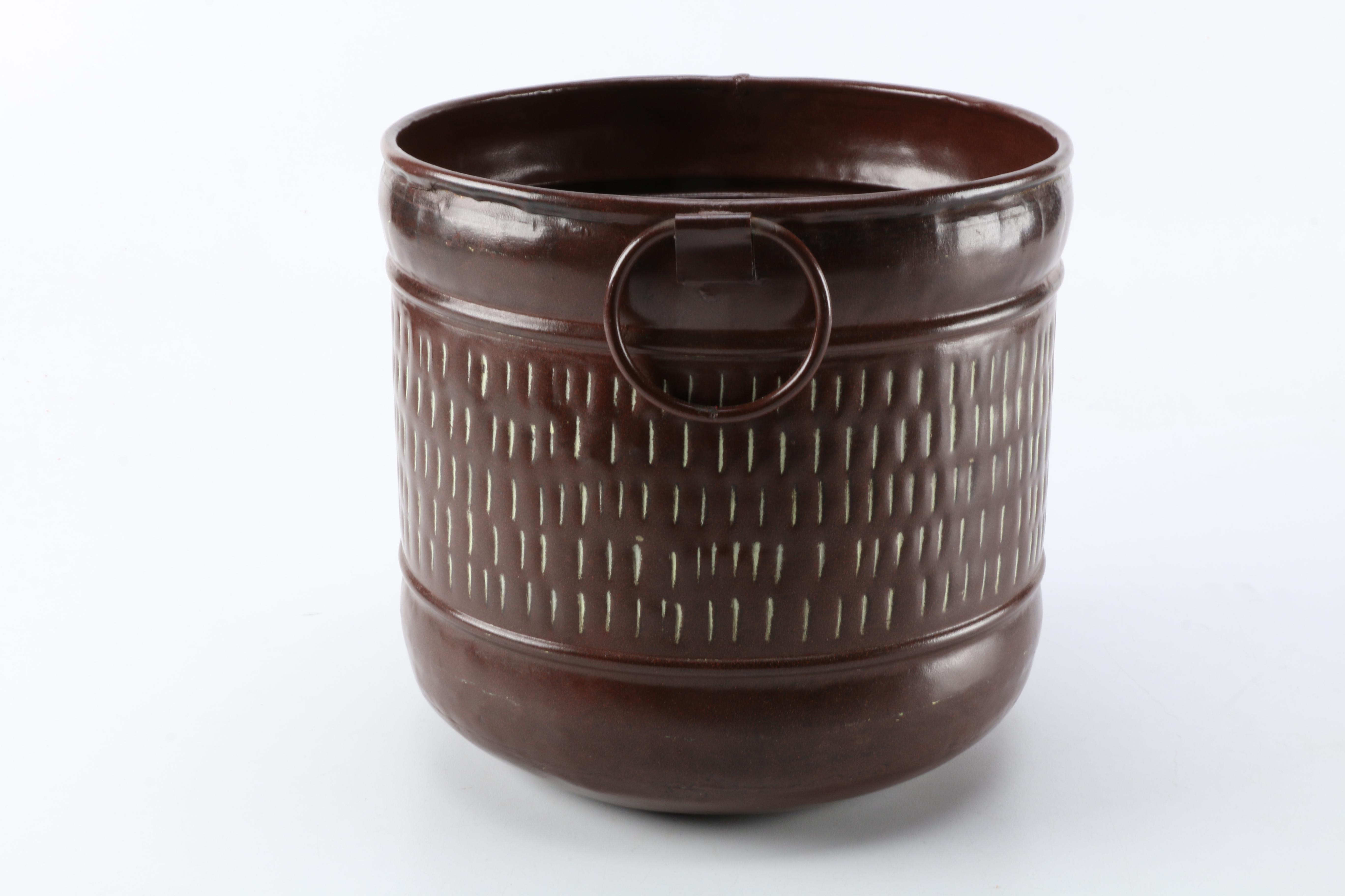 Embossed Brown Metal Container