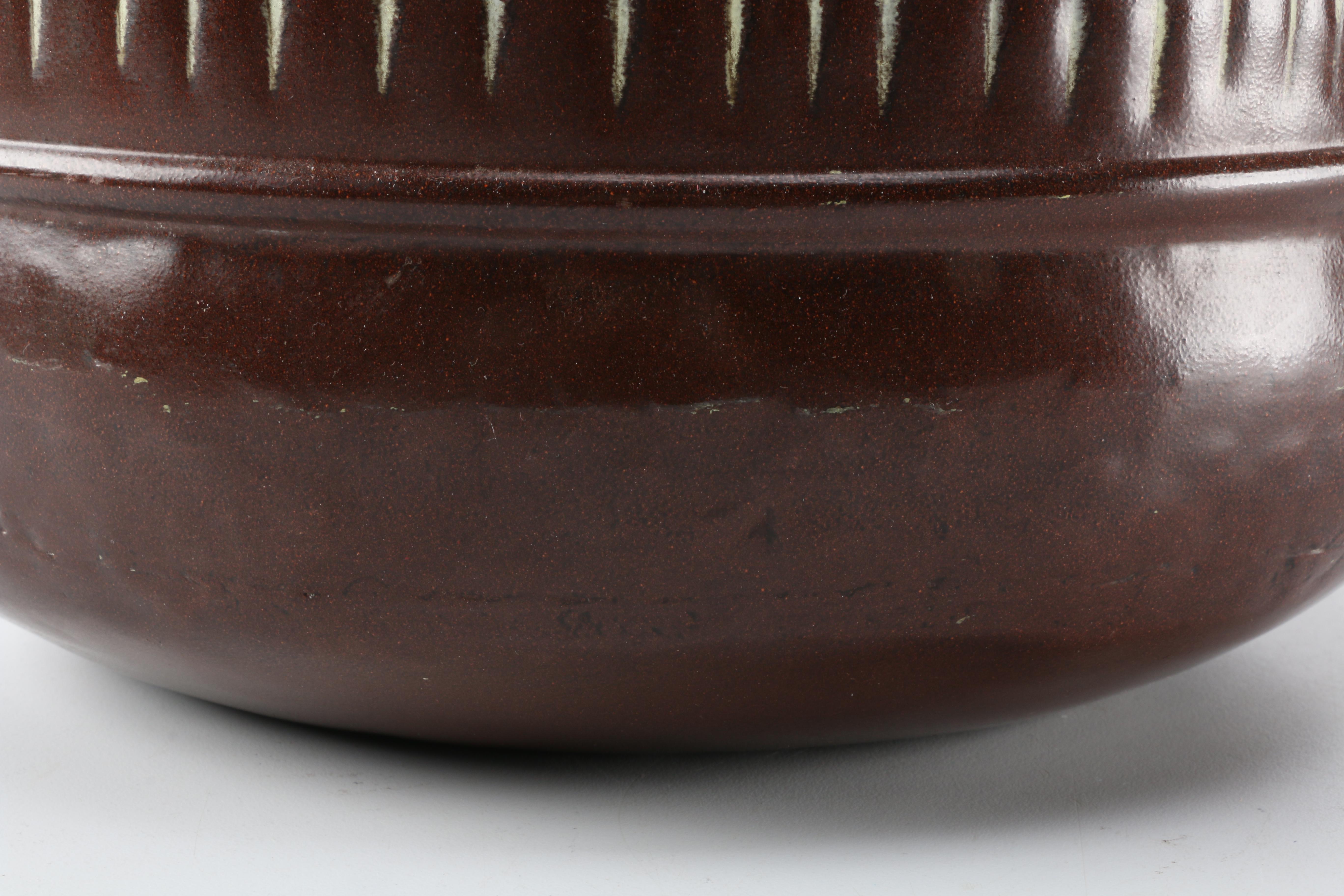 Embossed Brown Metal Container