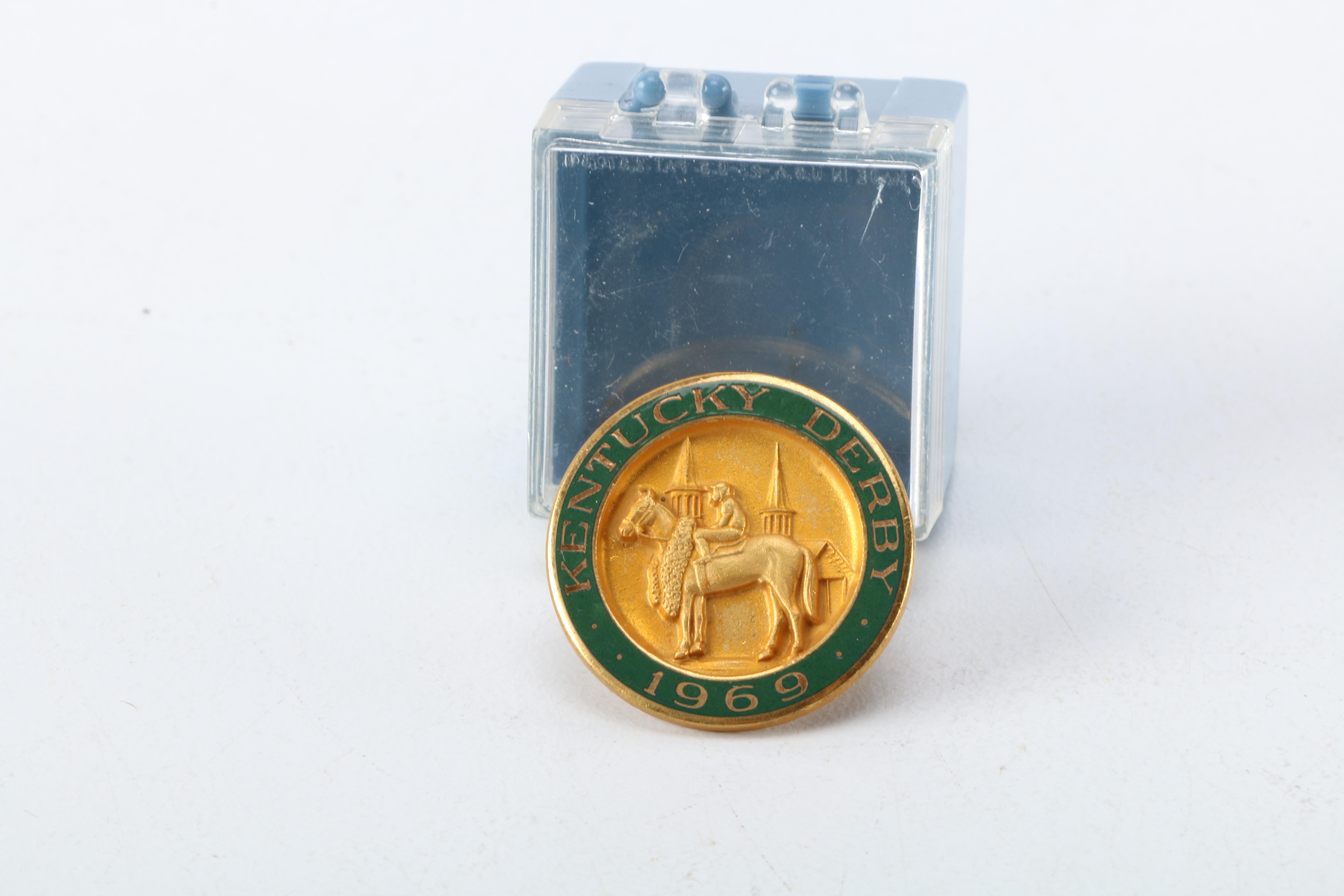 1969 Kentucky Derby Pin and 1981 D. H. Holmes Store Commemorative Medal
