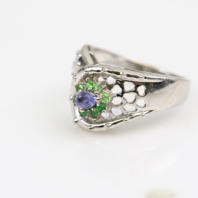 14K White Gold, Tanzanite, and Emerald Pierced Flower Ring