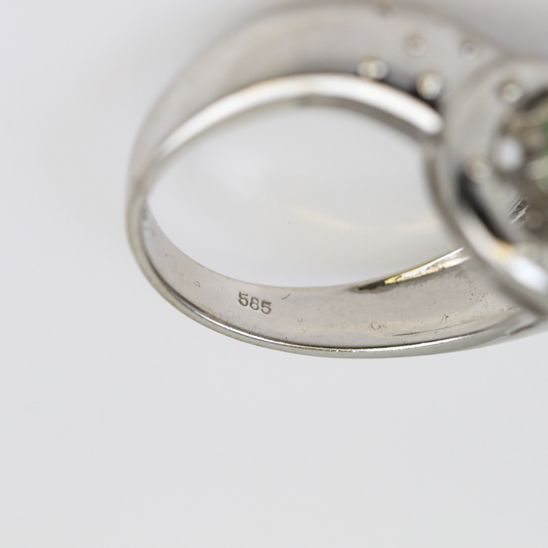 14K White Gold, Tanzanite, and Emerald Pierced Flower Ring