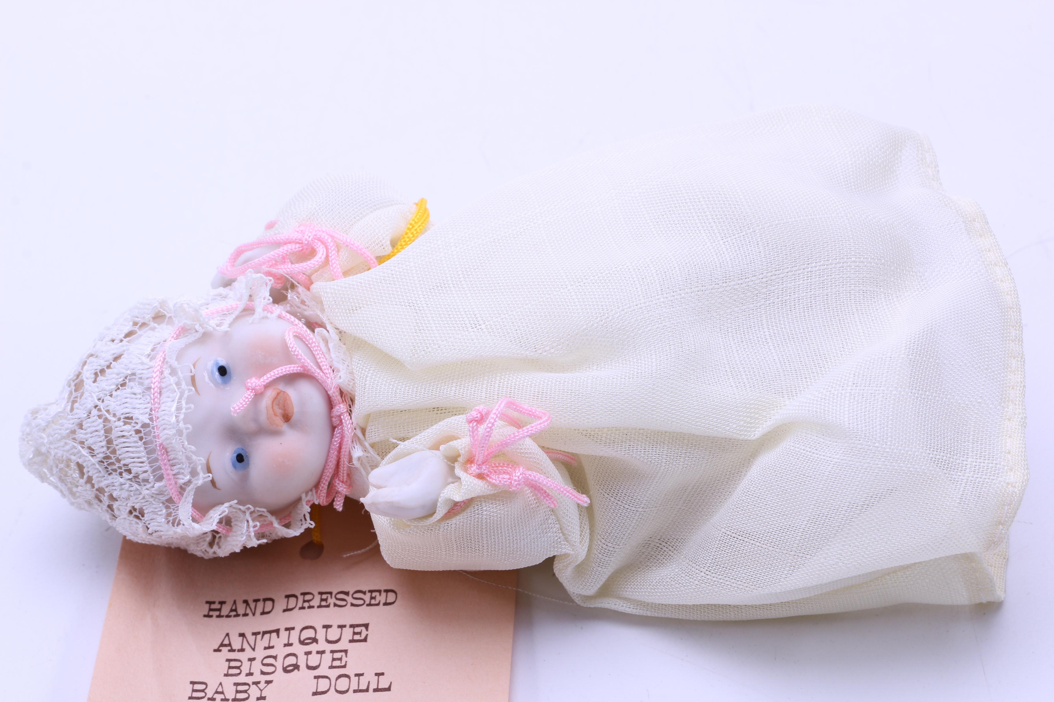 Assortment of Vintage Dolls and a Metal Stroller