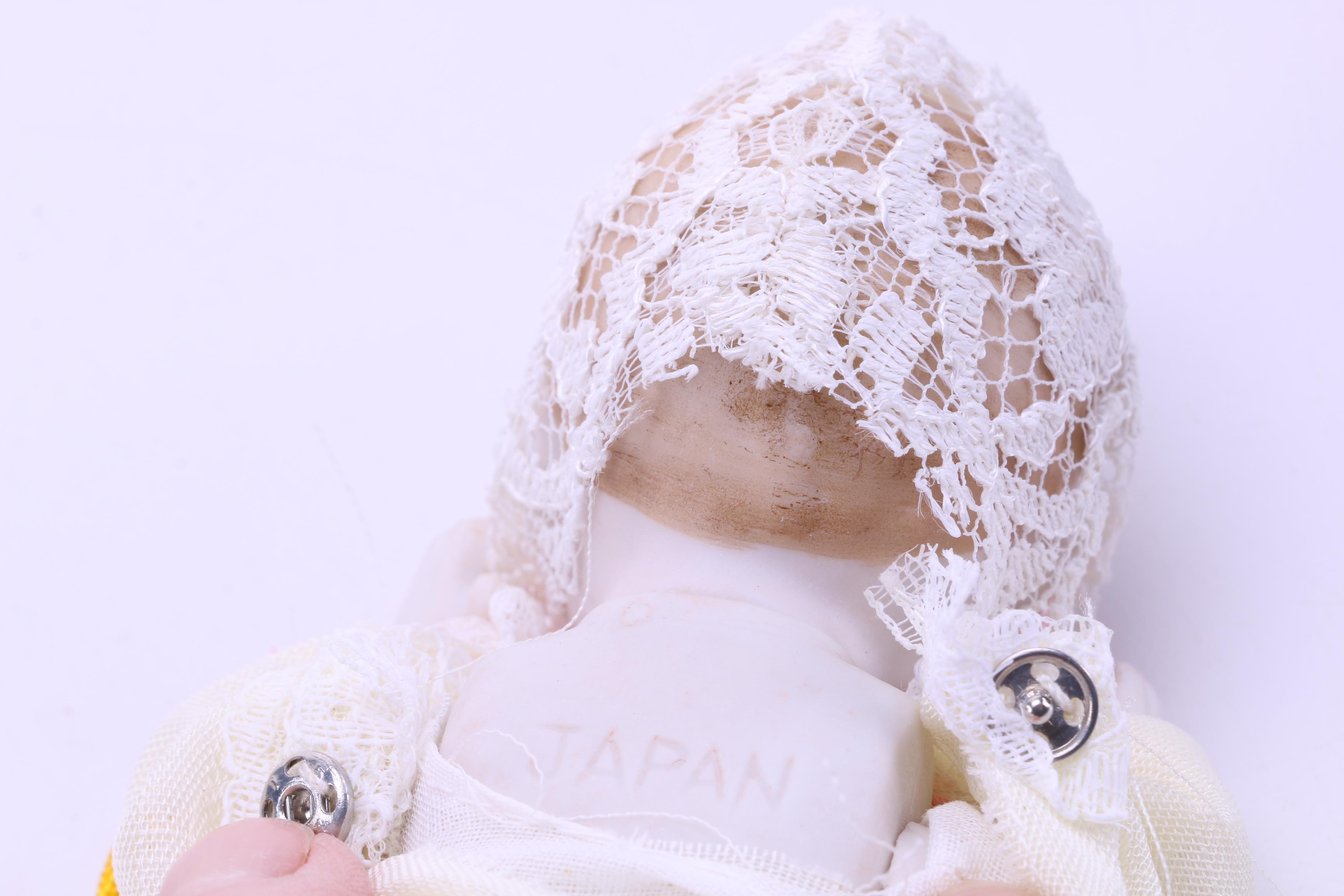 Assortment of Vintage Dolls and a Metal Stroller