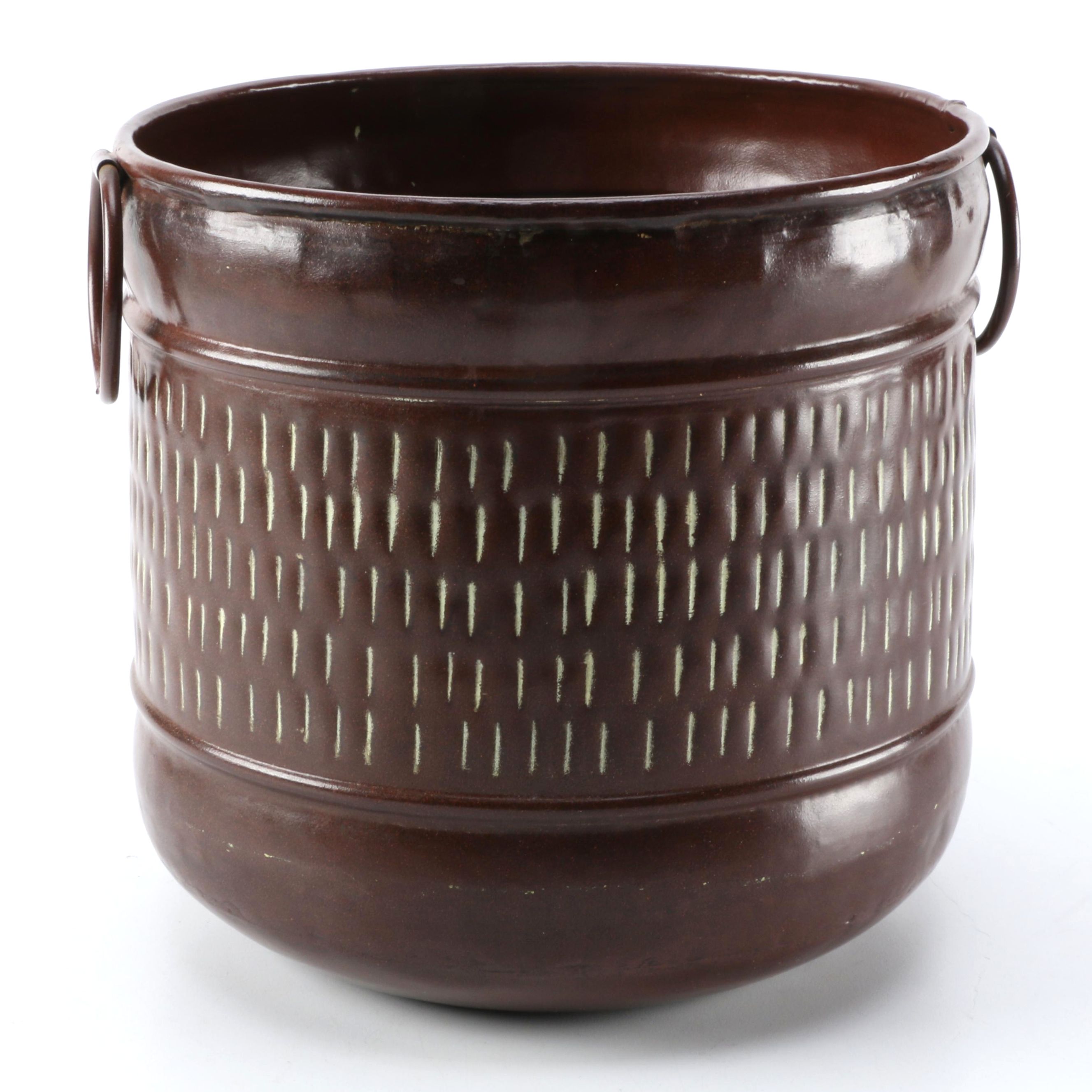 Embossed Brown Metal Container