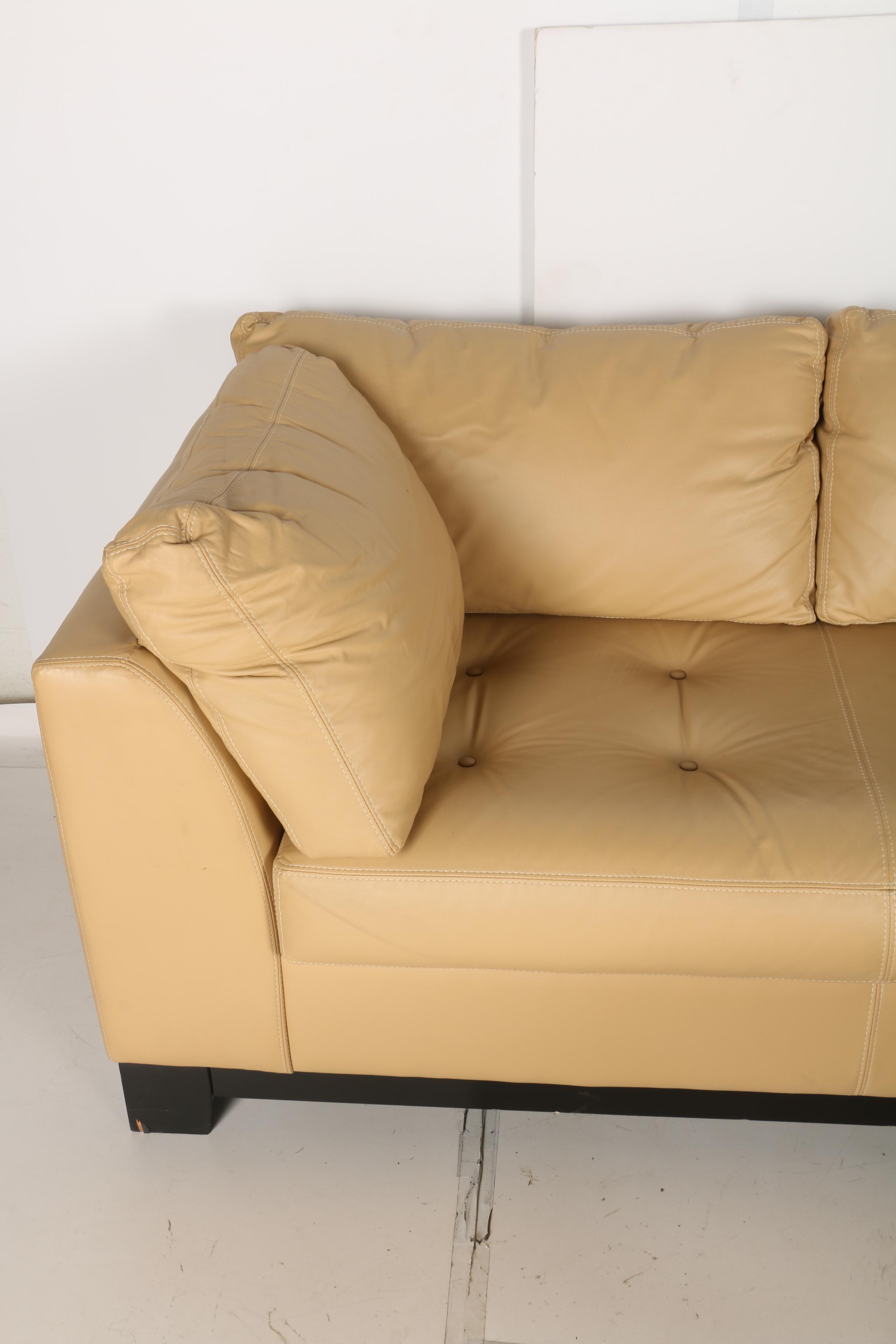 Elite Leather Sectional Sofa and Ottoman