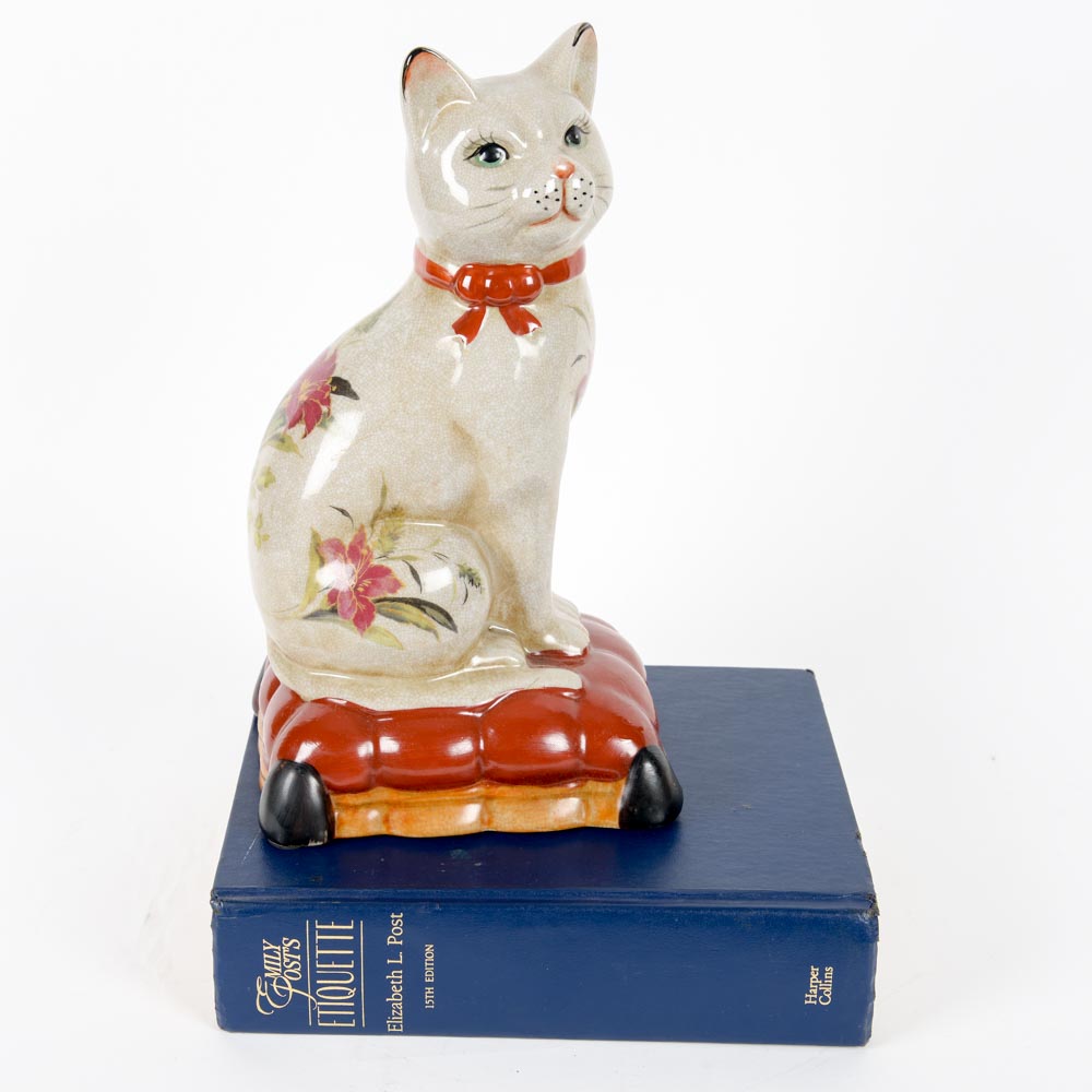 Copy of "Etiquette" by Emily Post with Ceramic Cat Figurine
