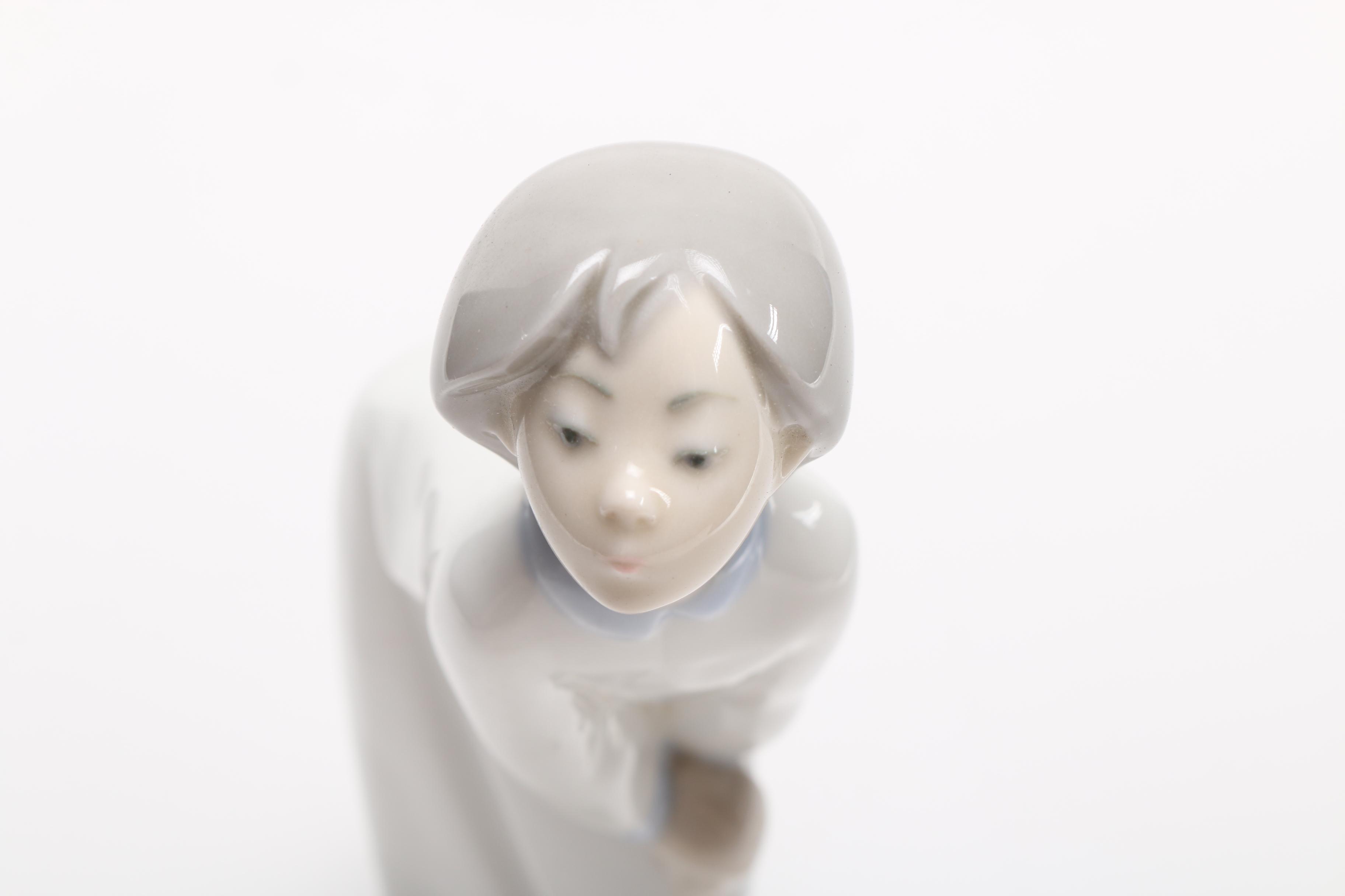 Lladró "Girl Kissing" Figurine