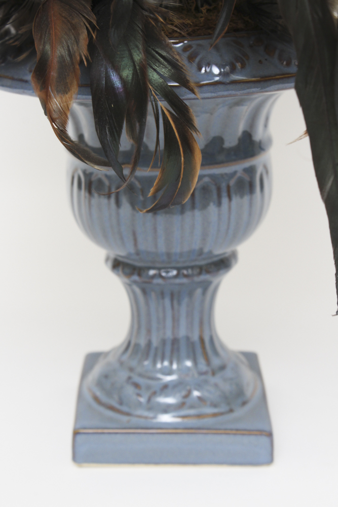 Floral and Feather Arrangement in Decorative Urn