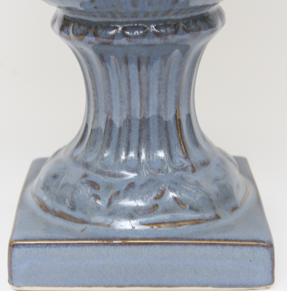 Floral and Feather Arrangement in Decorative Urn